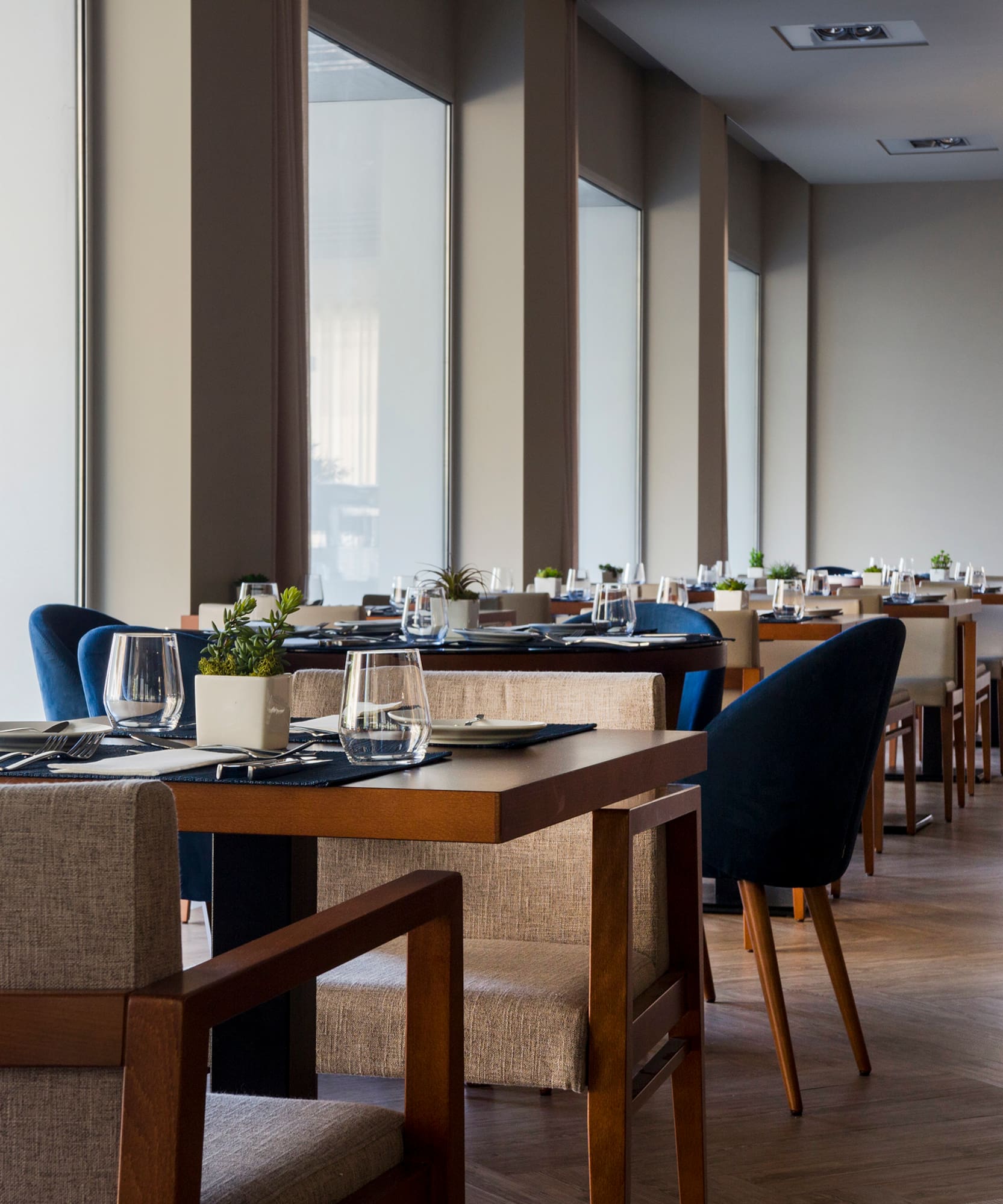 a restaurant with tables and chairs
