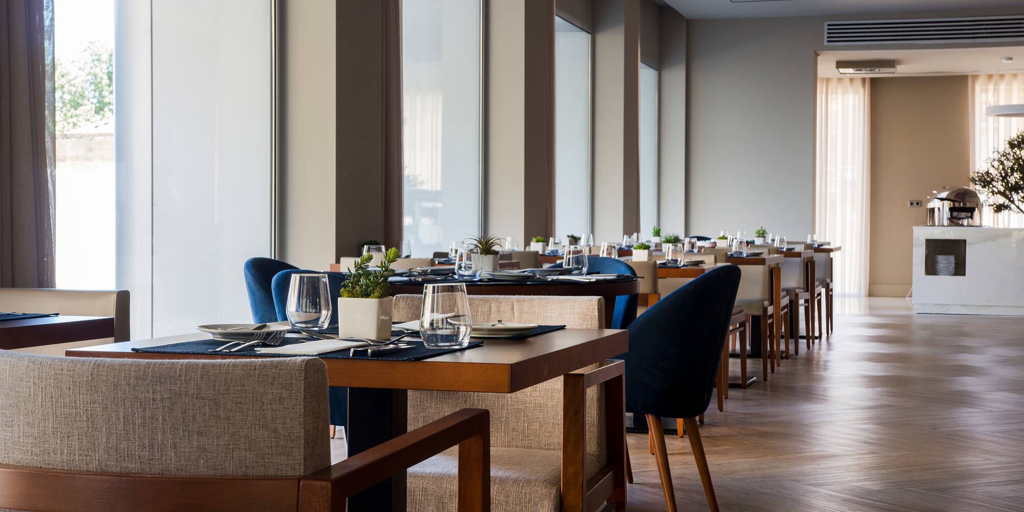 a restaurant with tables and chairs