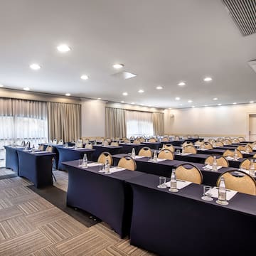 a room with tables and chairs