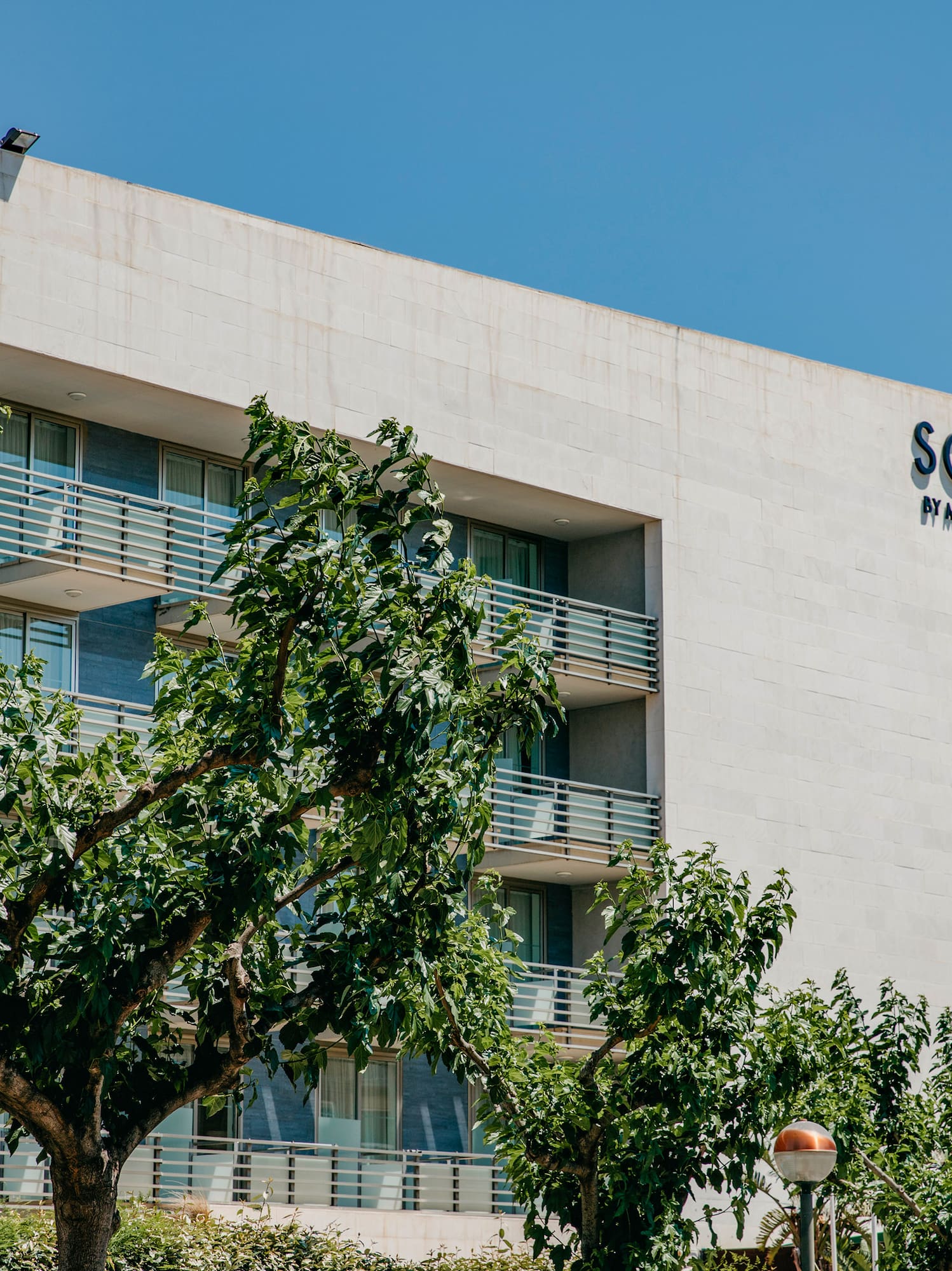 a building with trees in front of it