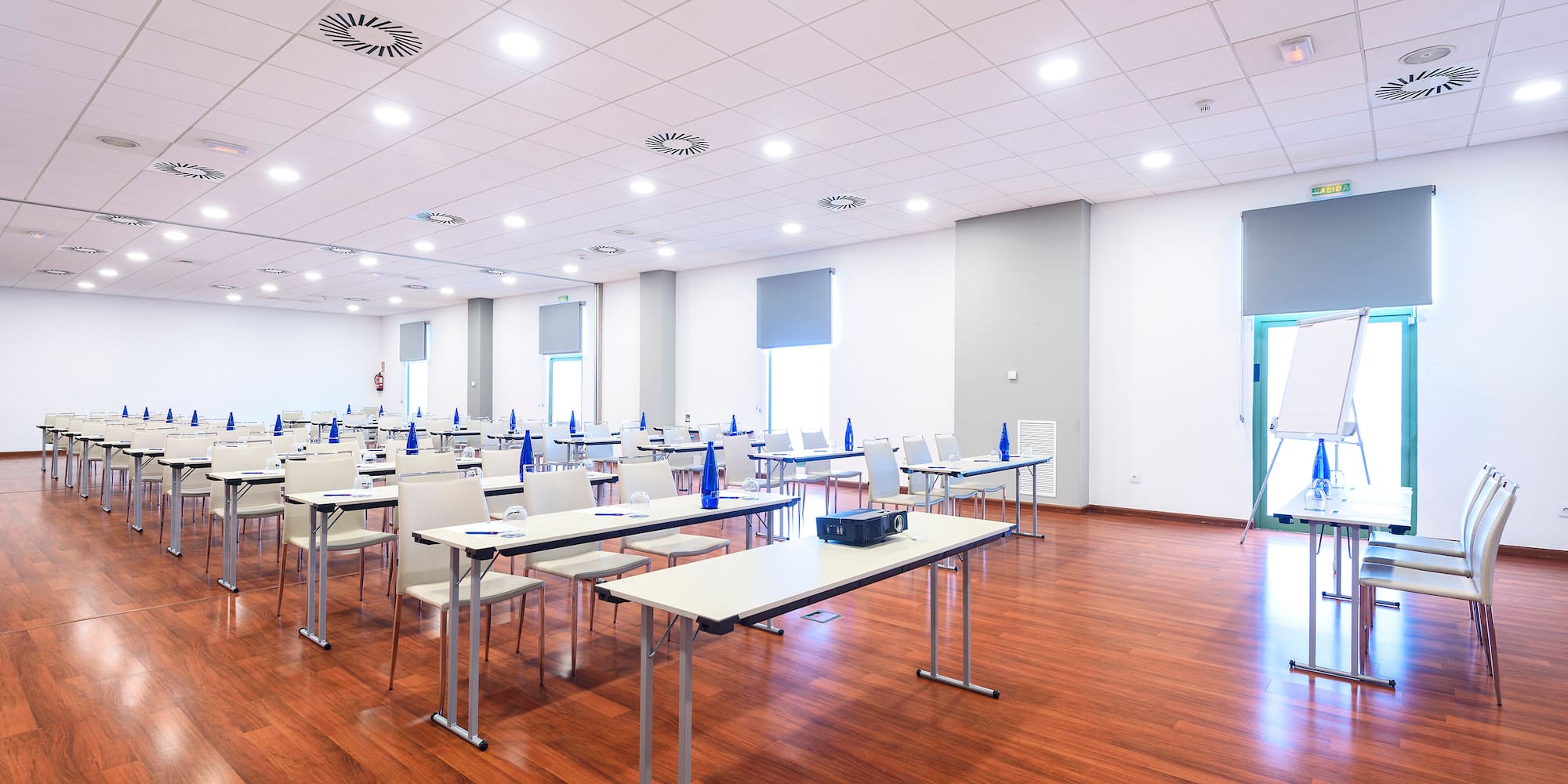 a room with tables and chairs