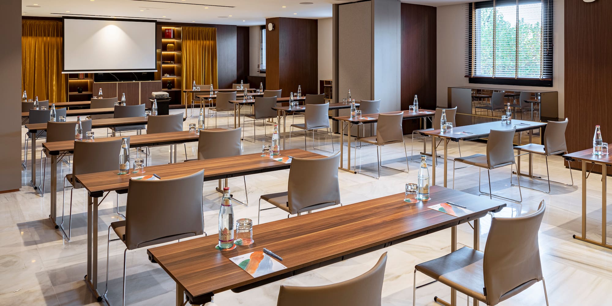 a room with tables and chairs