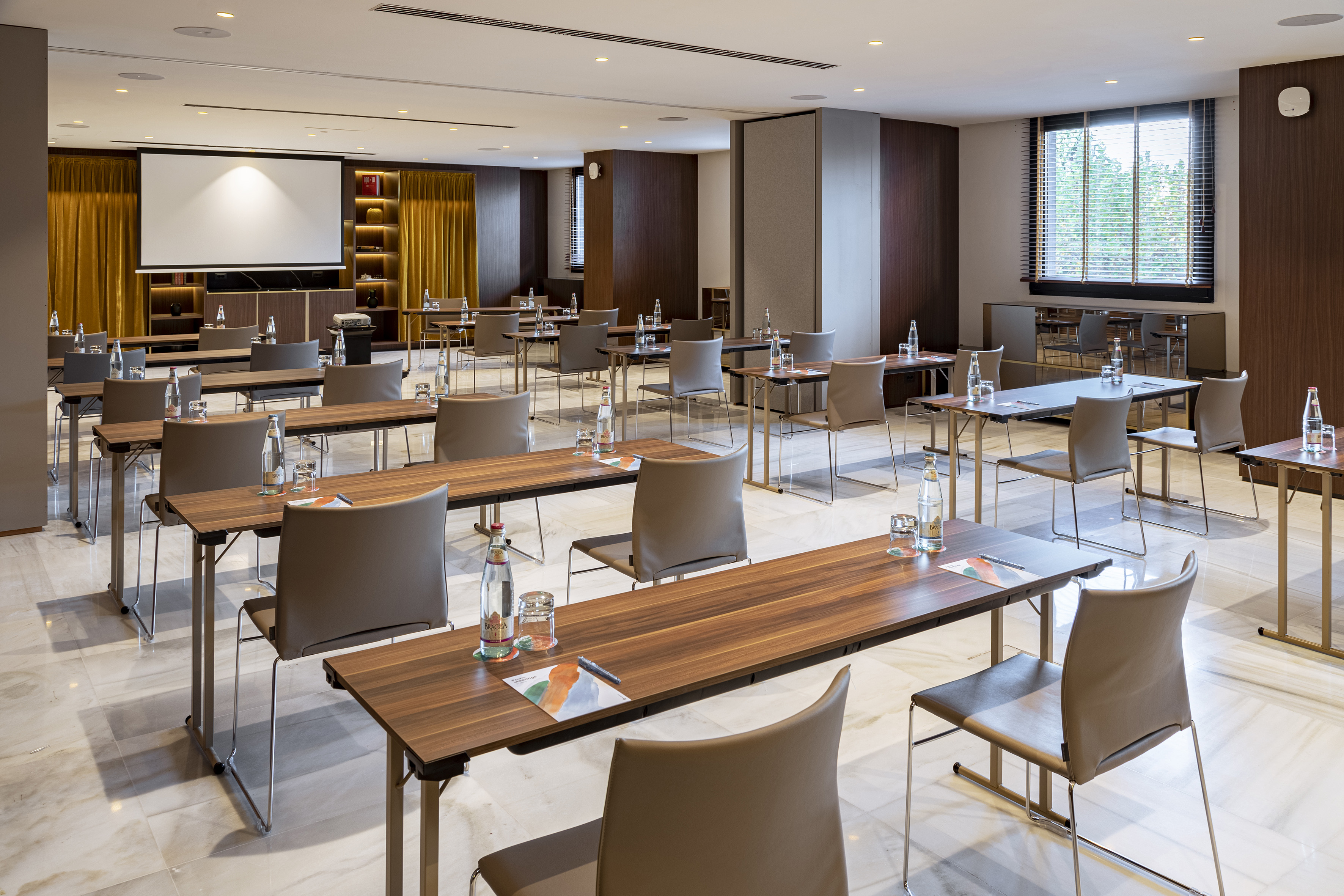 a room with tables and chairs