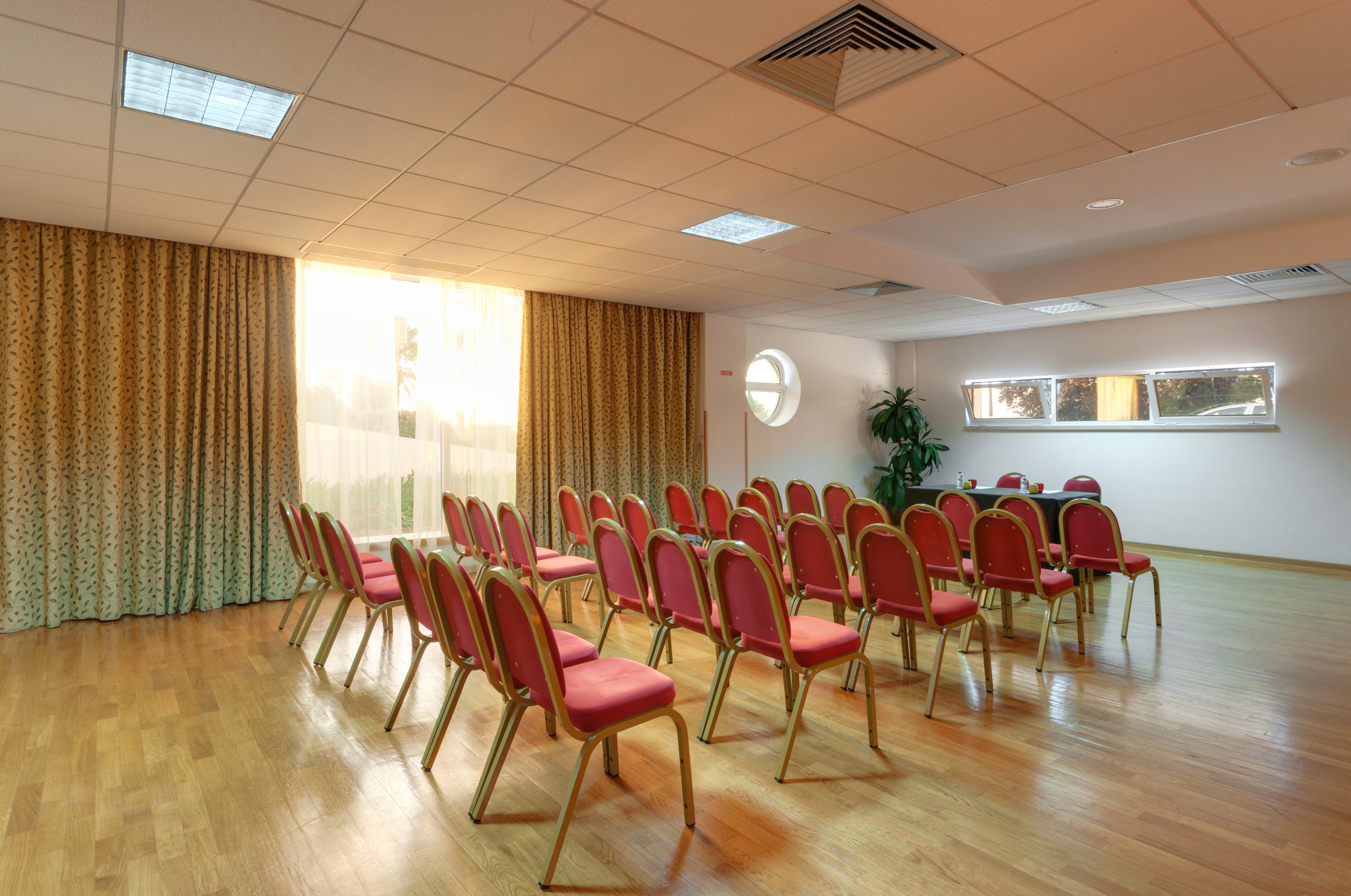 a room with chairs and tables