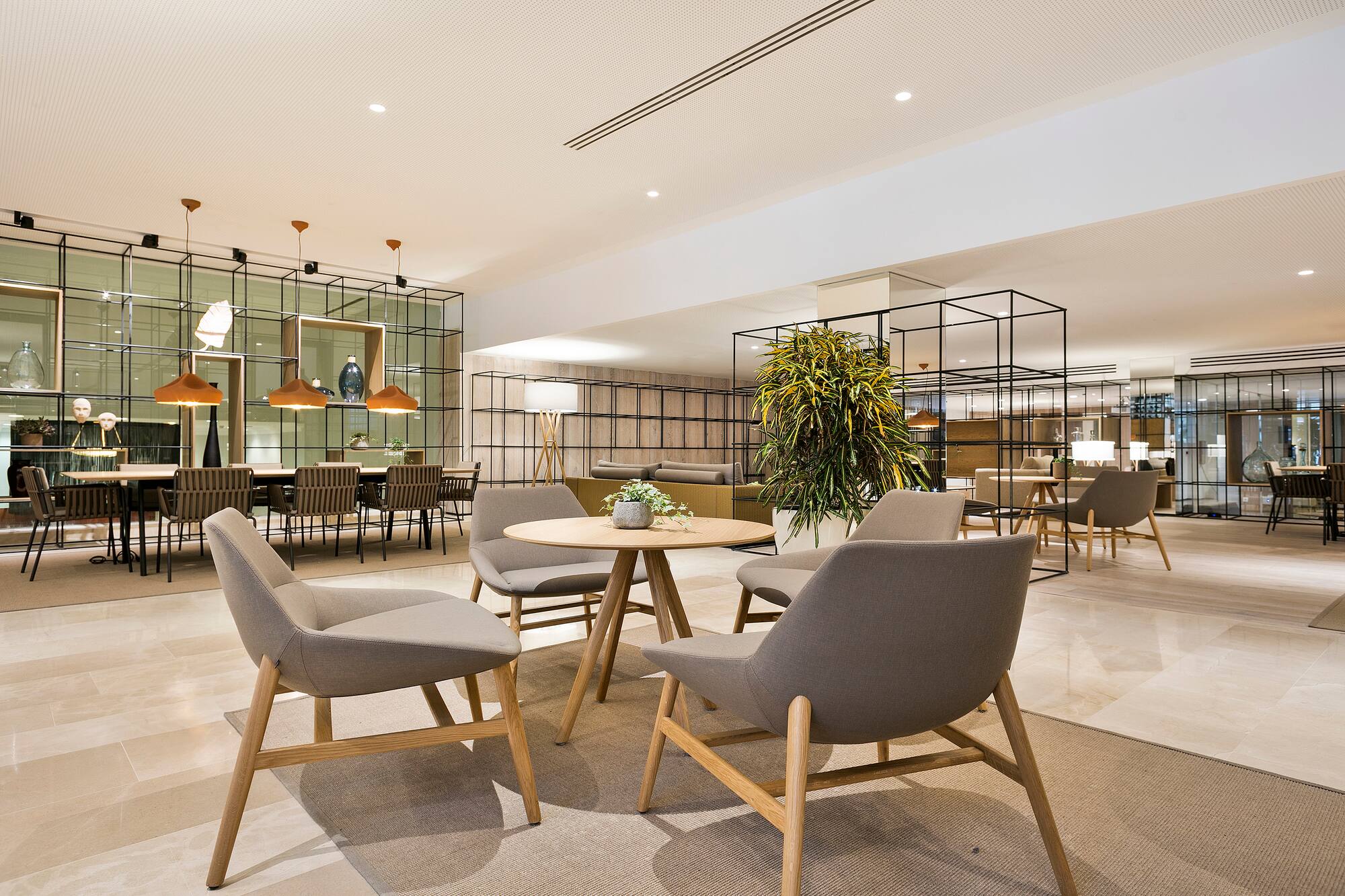 a room with chairs and tables