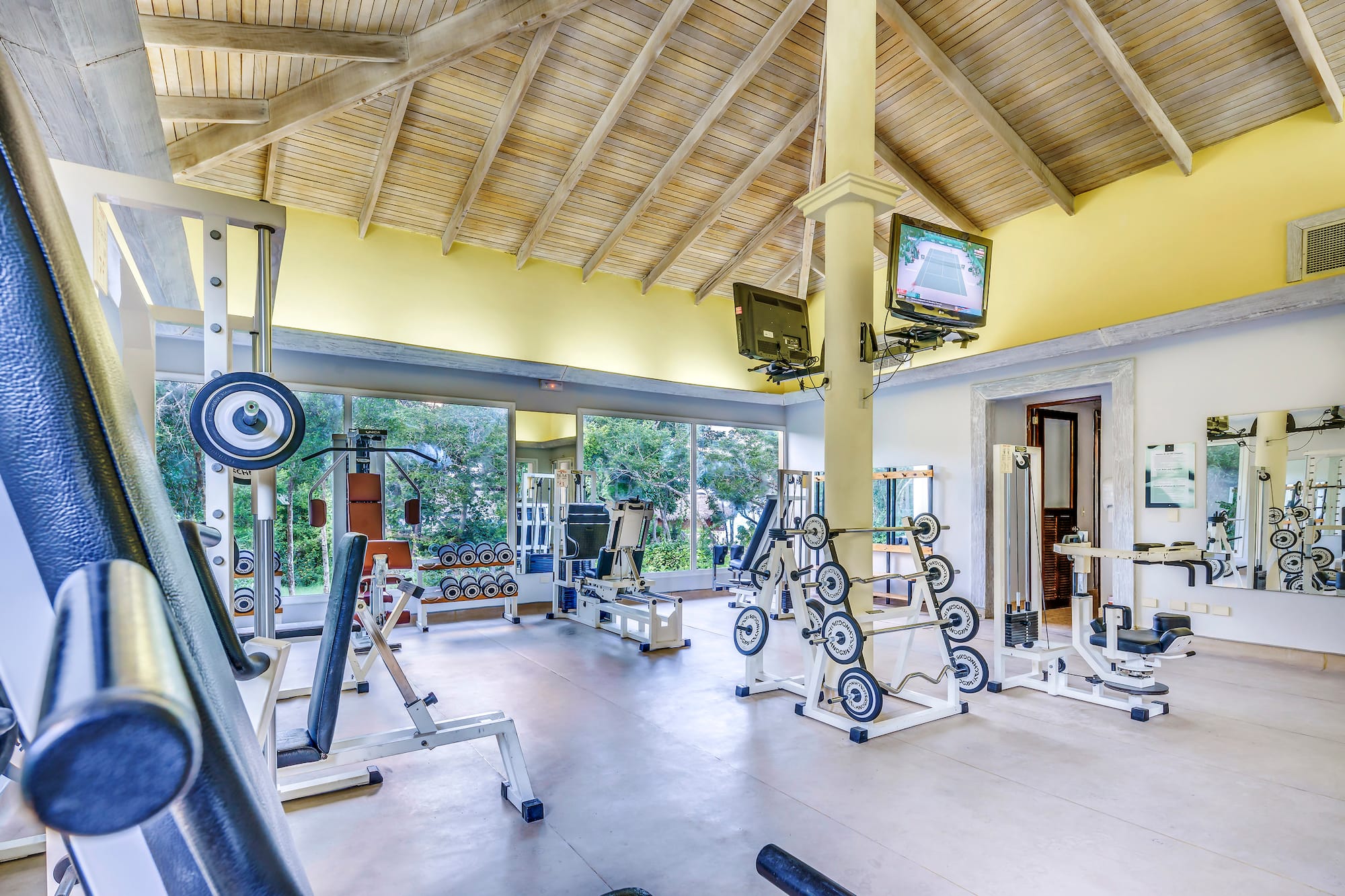 a large room with exercise equipment