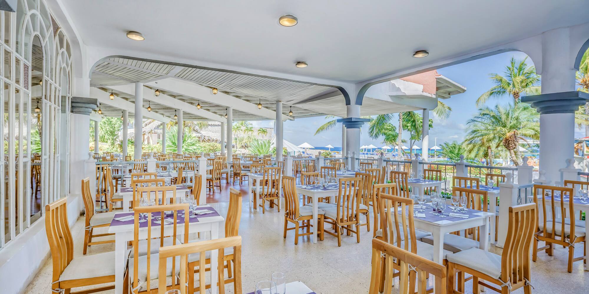 a restaurant with tables and chairs