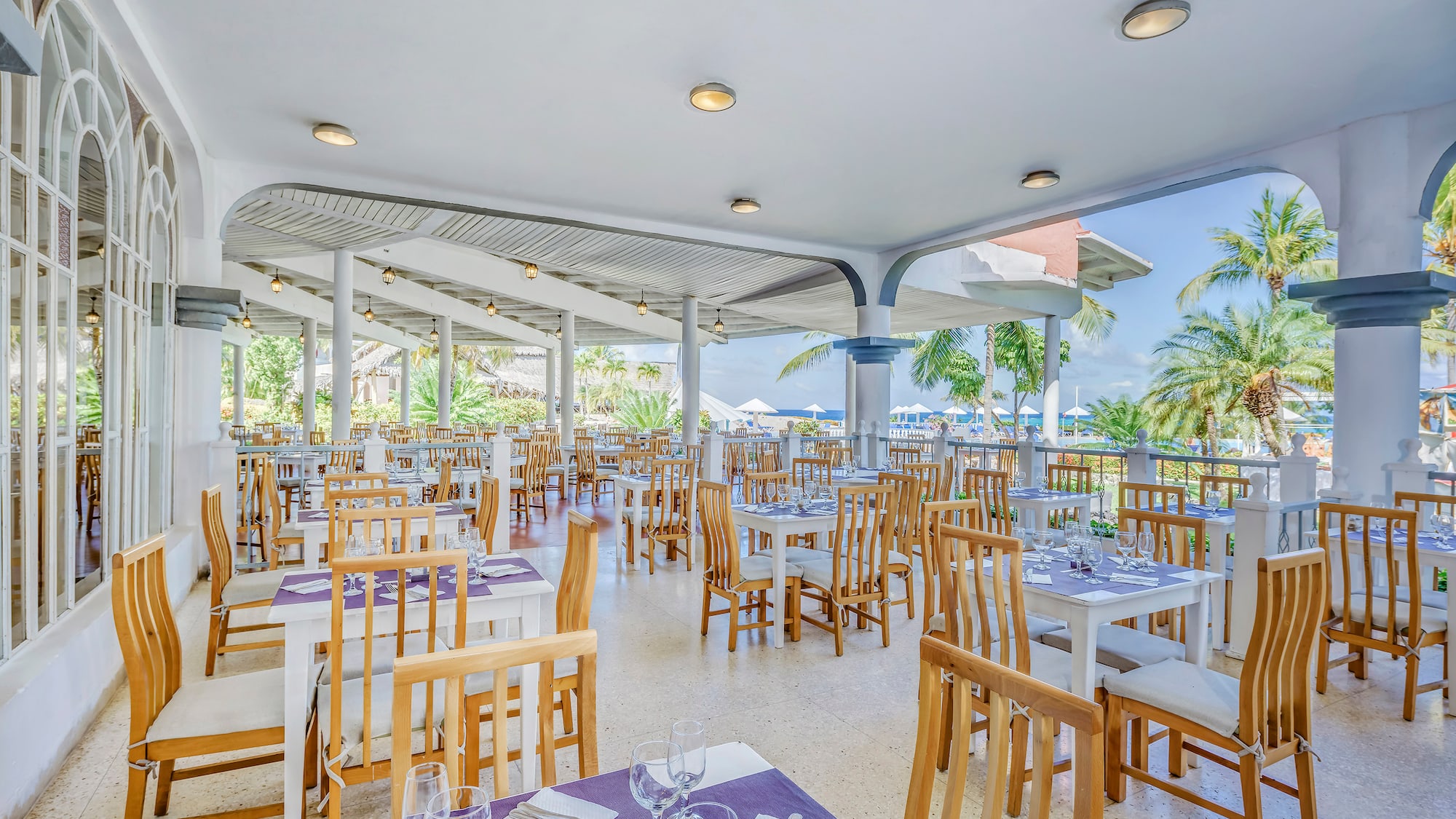 a restaurant with tables and chairs