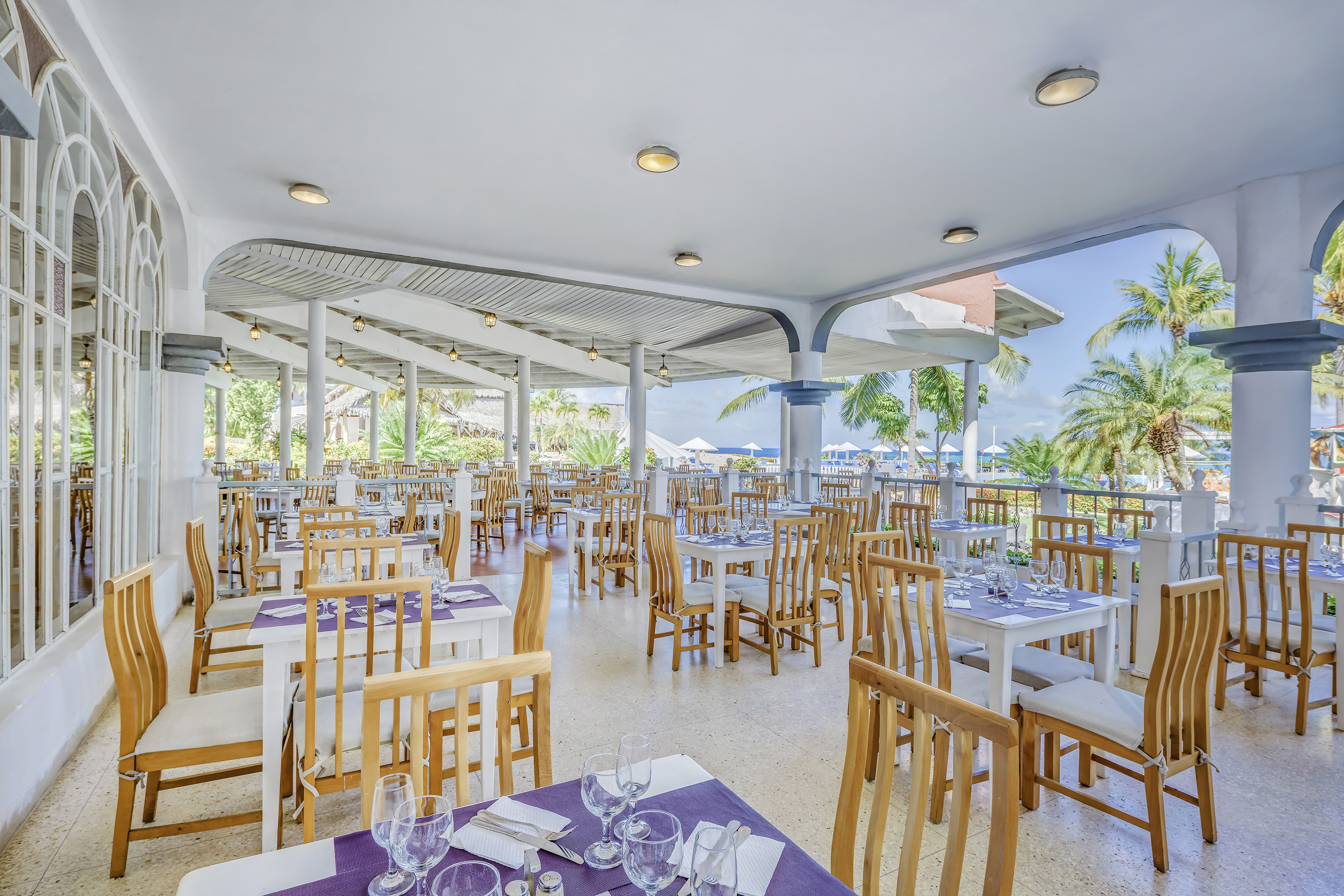 a restaurant with tables and chairs