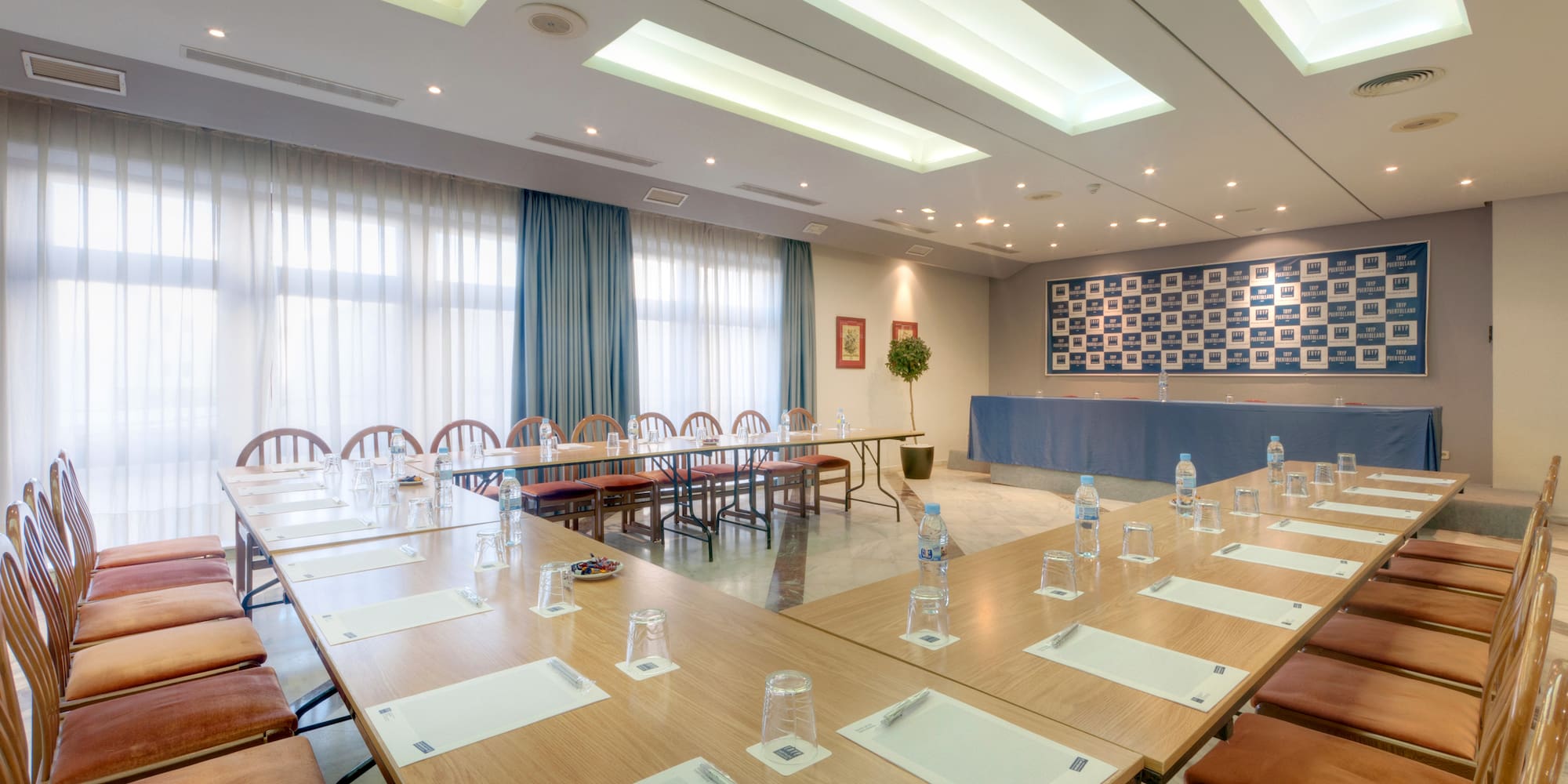 a room with a table and chairs