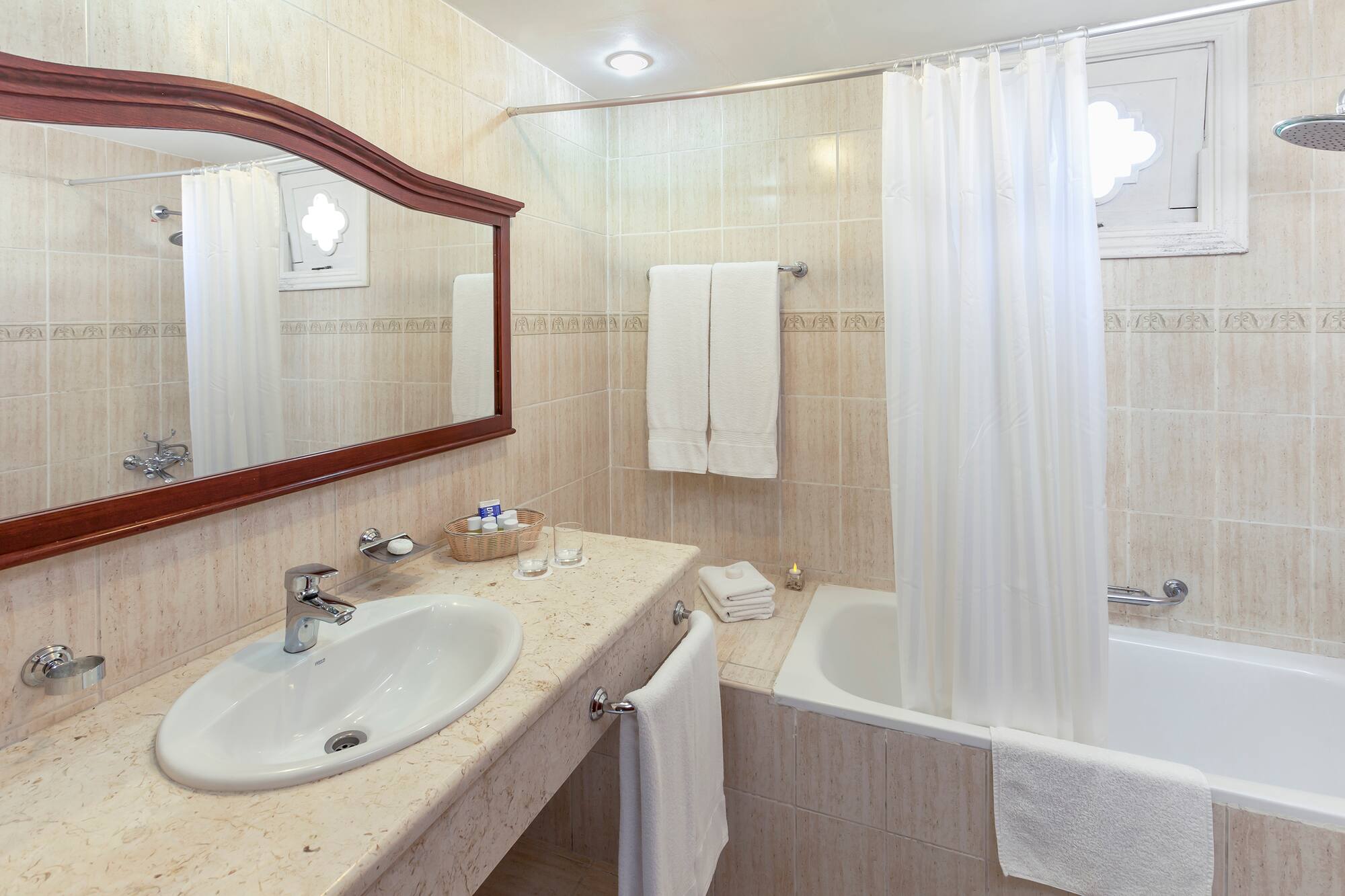 a bathroom with a sink and bathtub