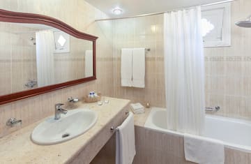 a bathroom with a sink and bathtub