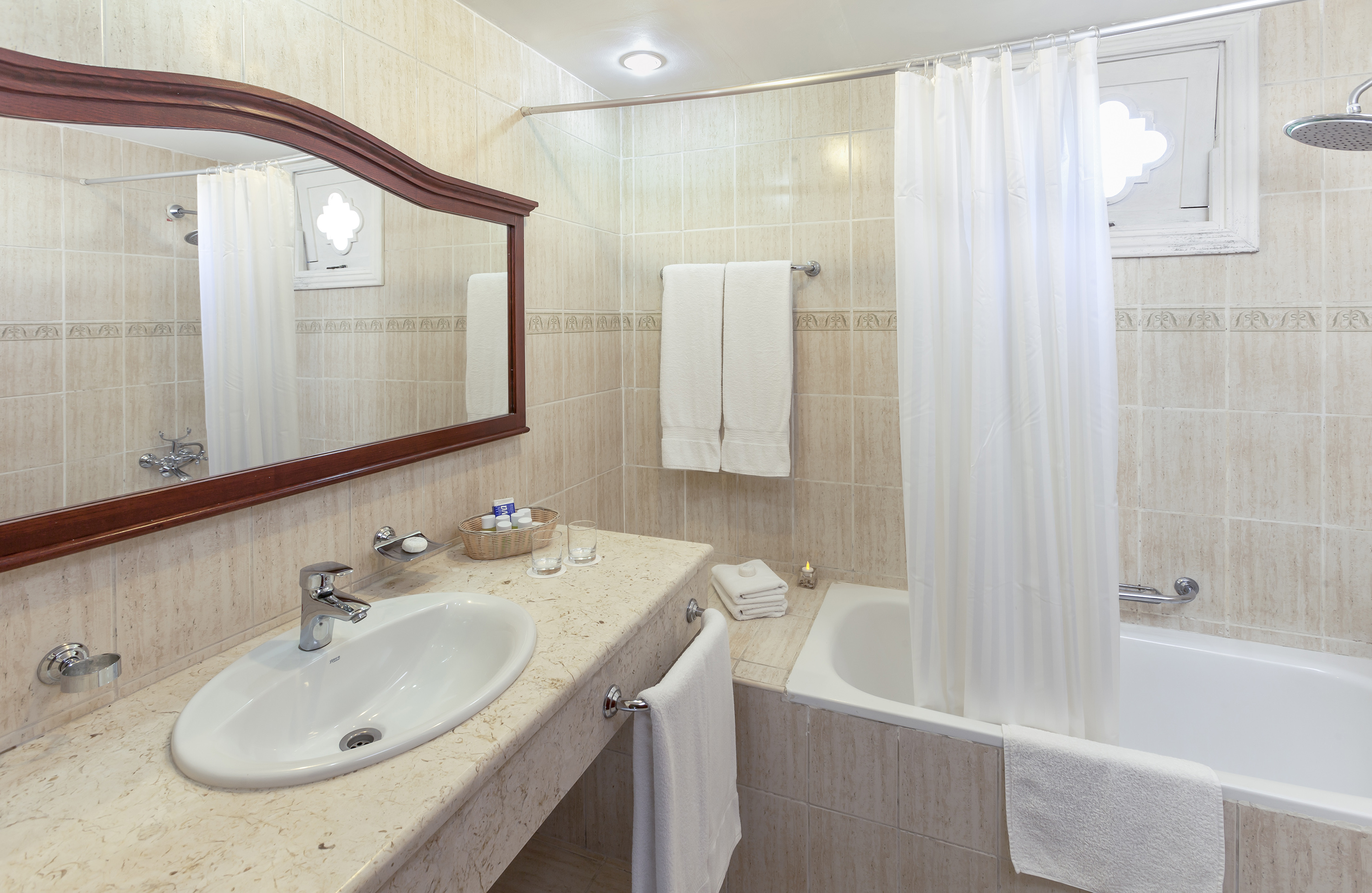 a bathroom with a sink and bathtub