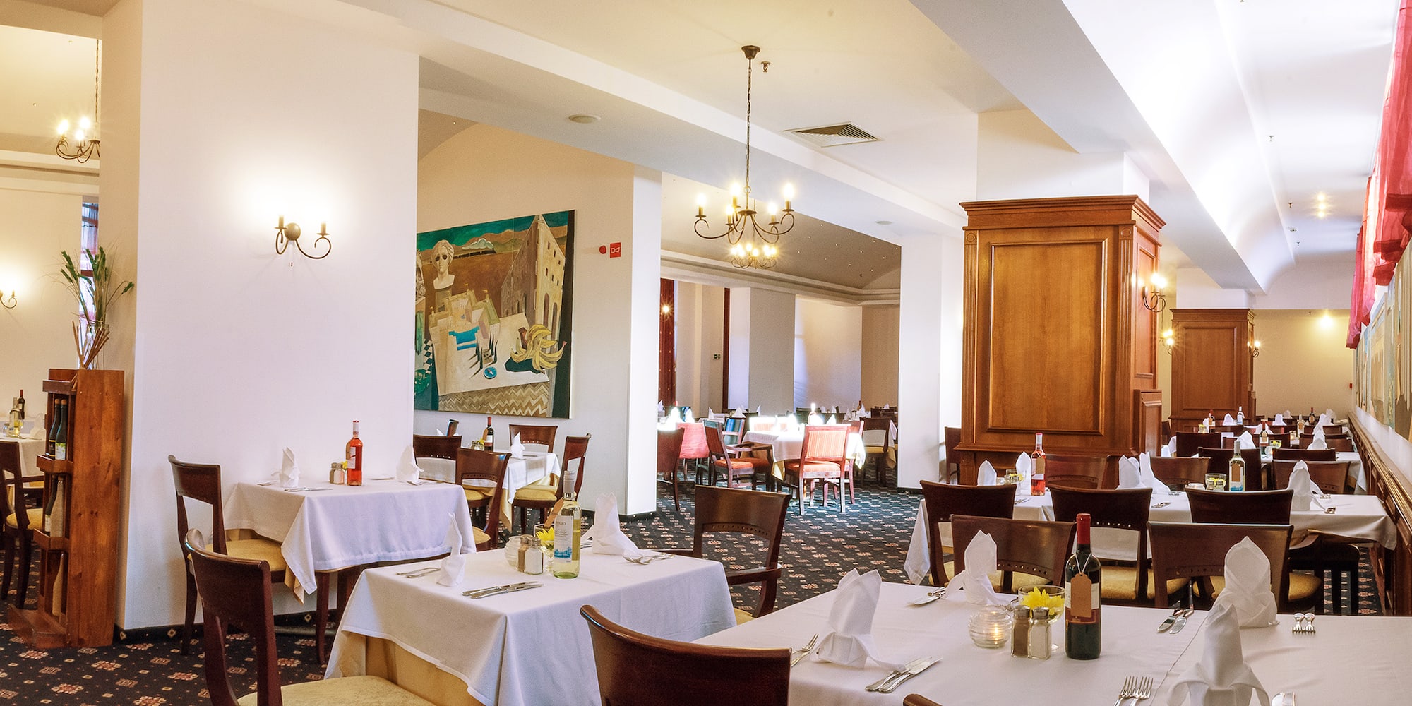 a room with tables and chairs