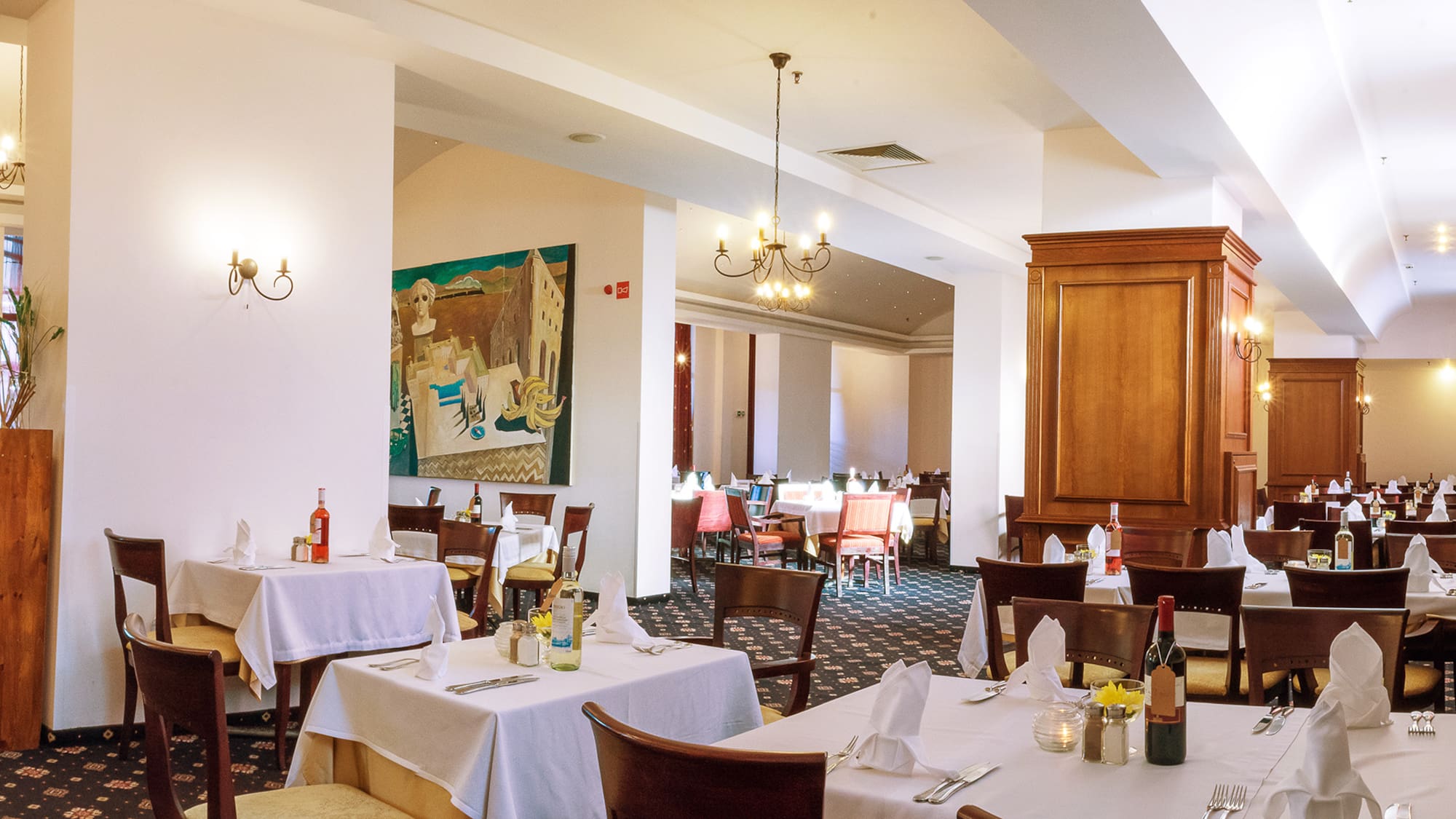 a room with tables and chairs