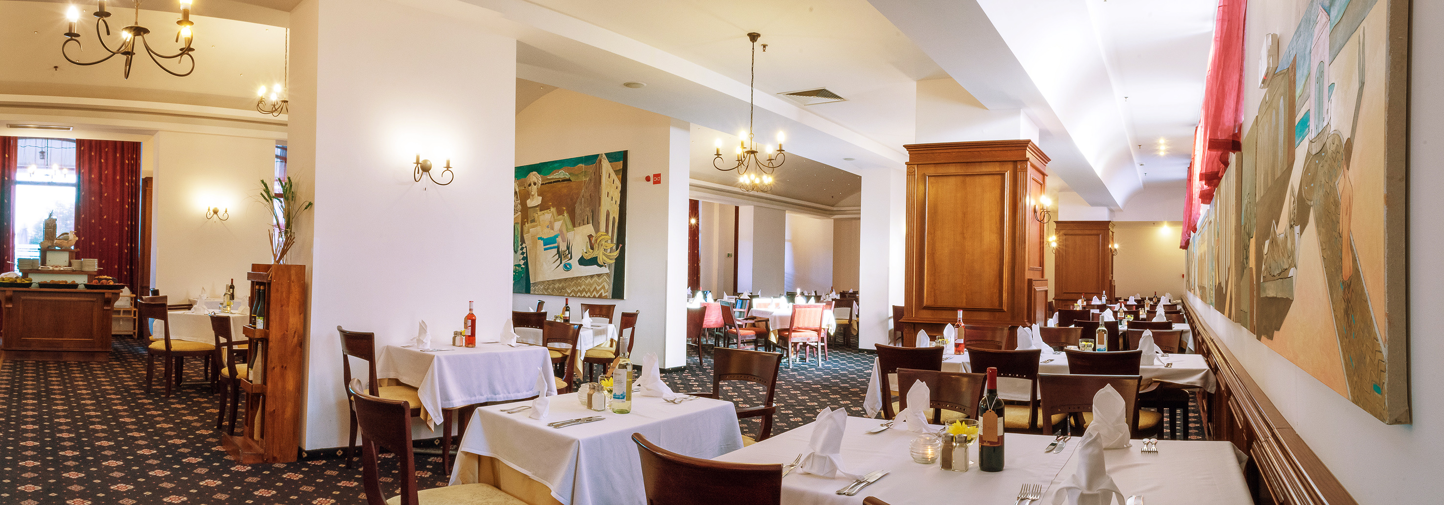 a room with tables and chairs