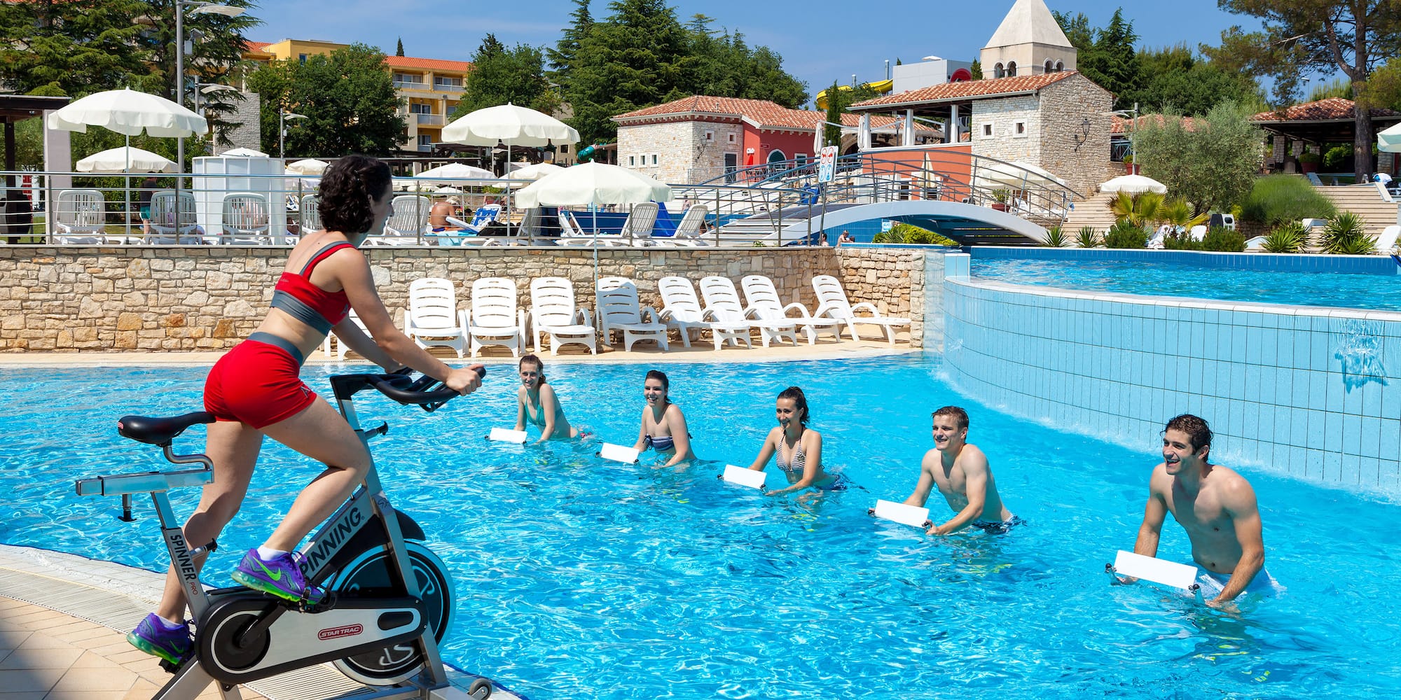 a group of people in a pool