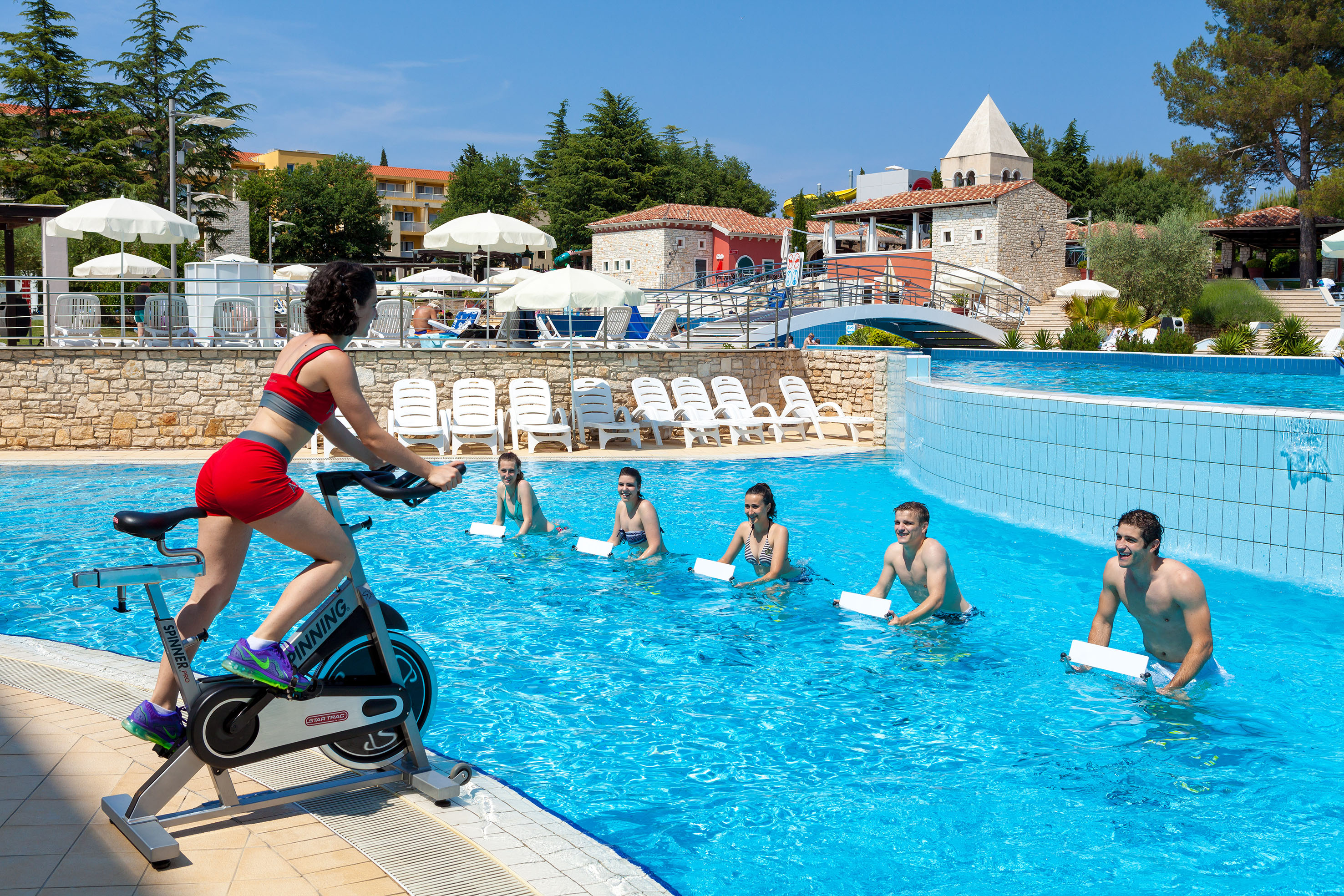 a group of people in a pool