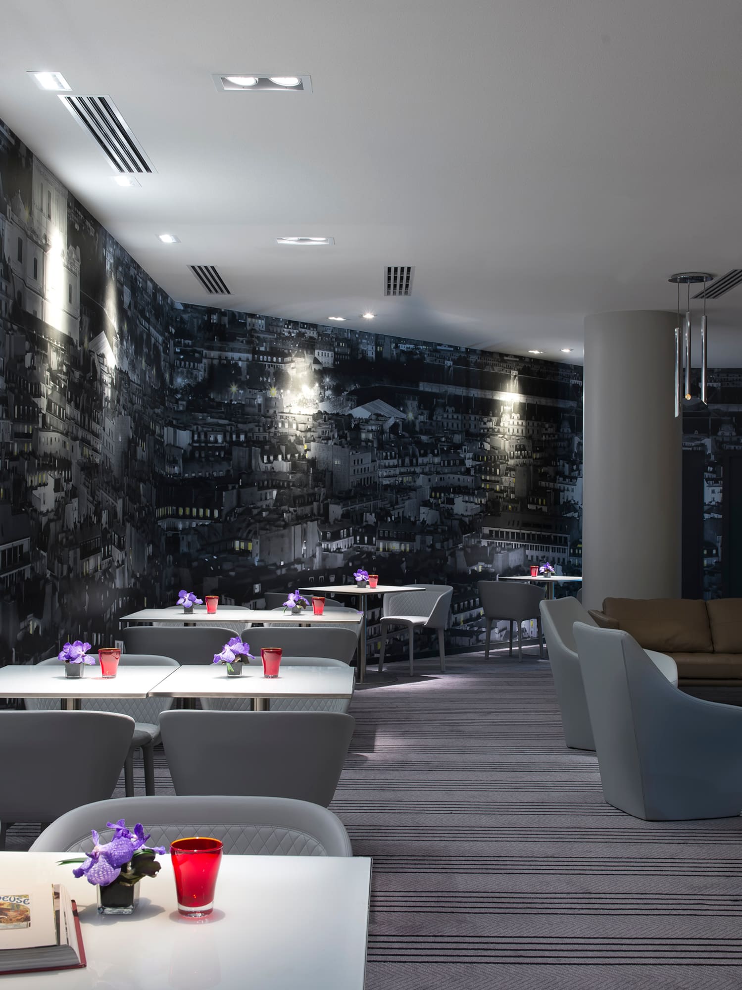 a room with tables and chairs