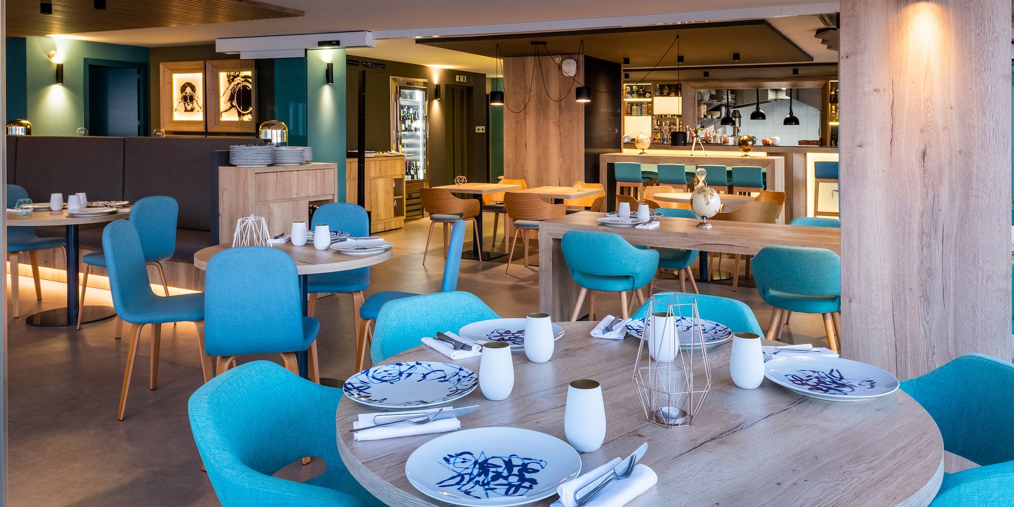 a restaurant with tables and chairs