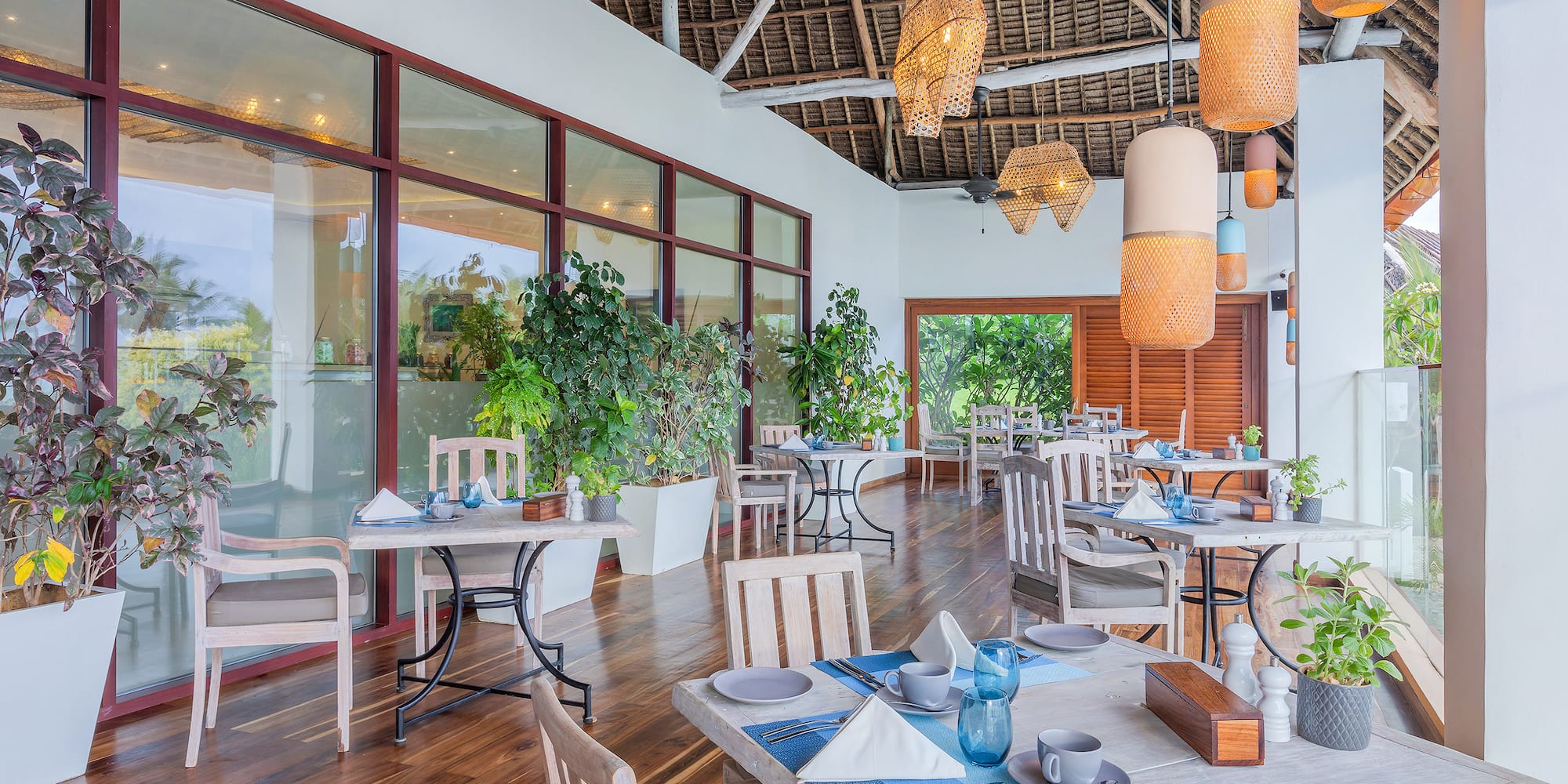 a restaurant with tables and chairs