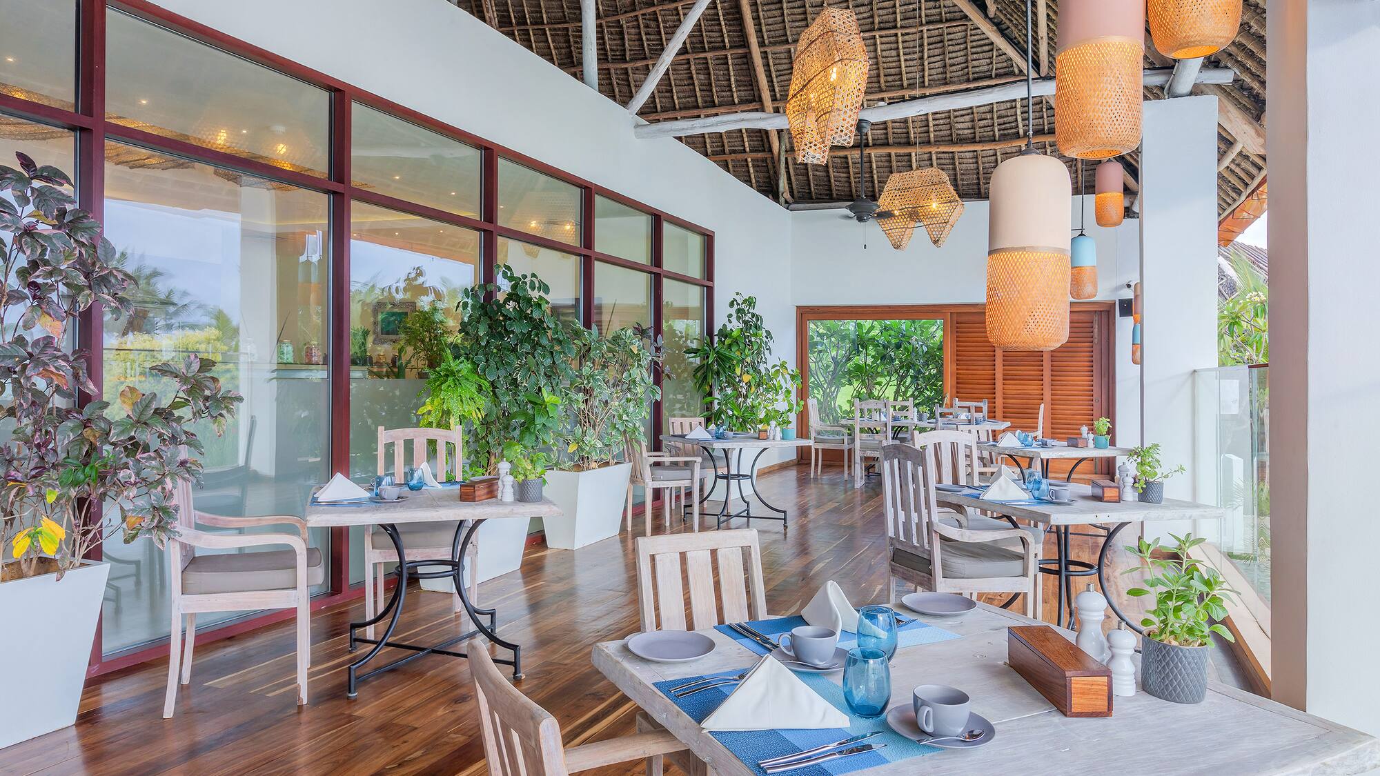 a restaurant with tables and chairs