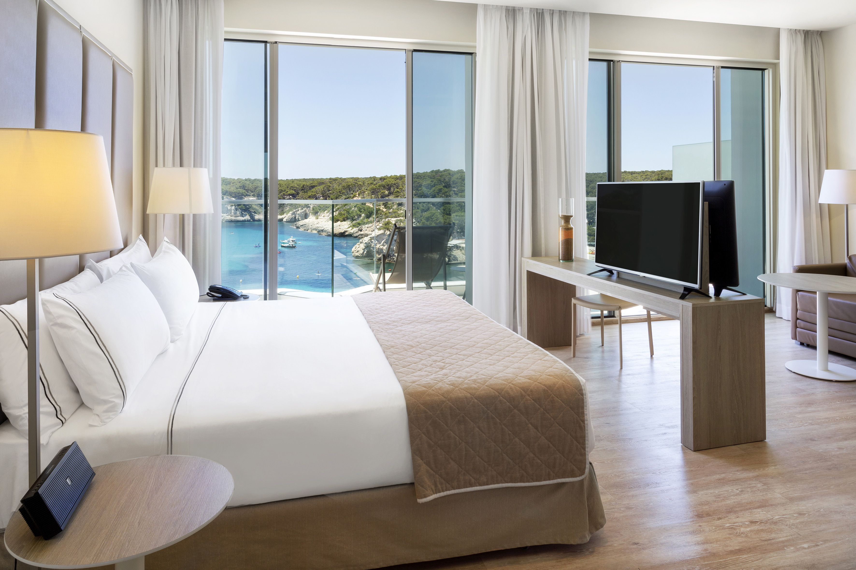 a room with a television and a bed