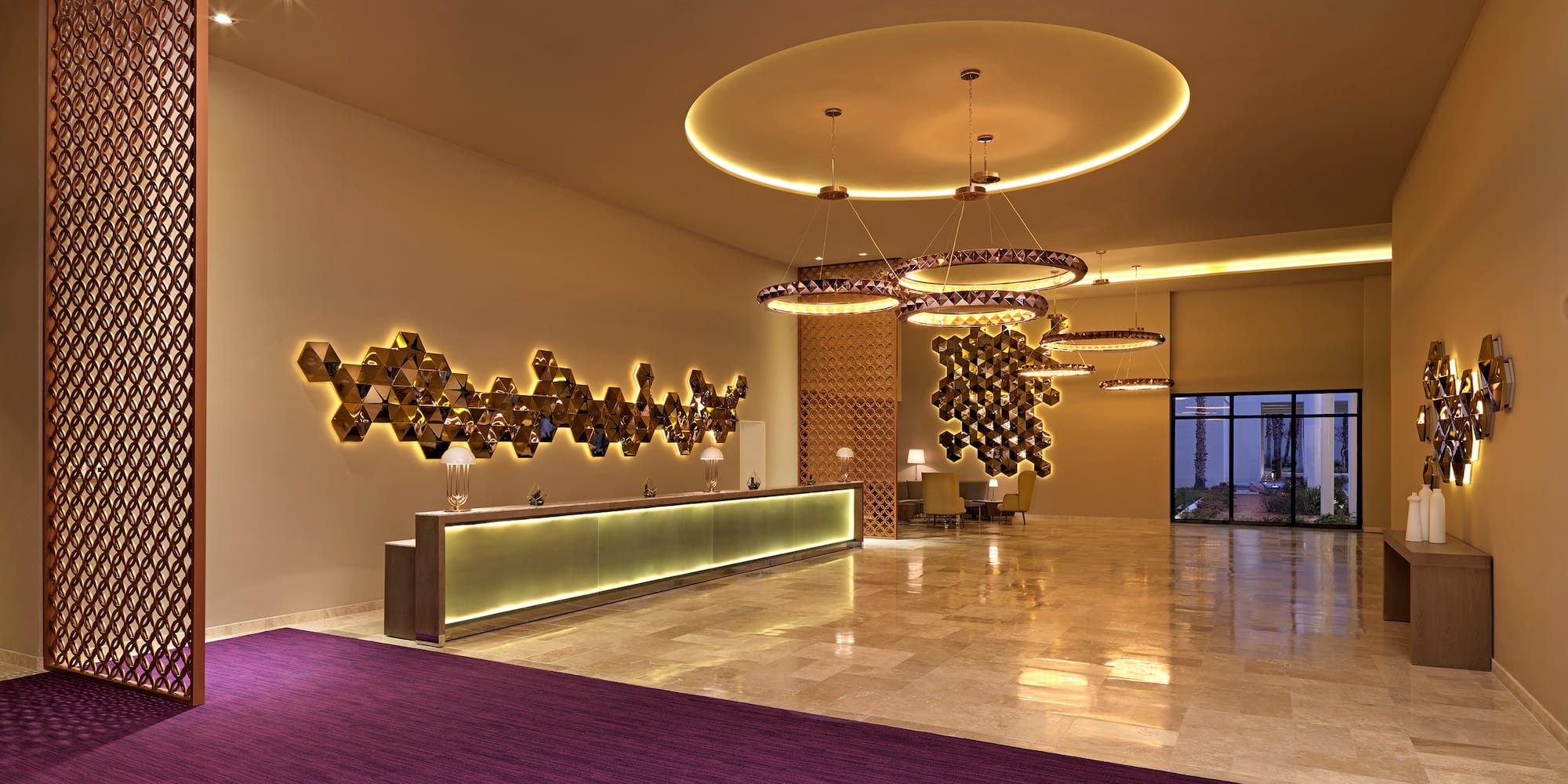a lobby with a purple rug and a purple carpet