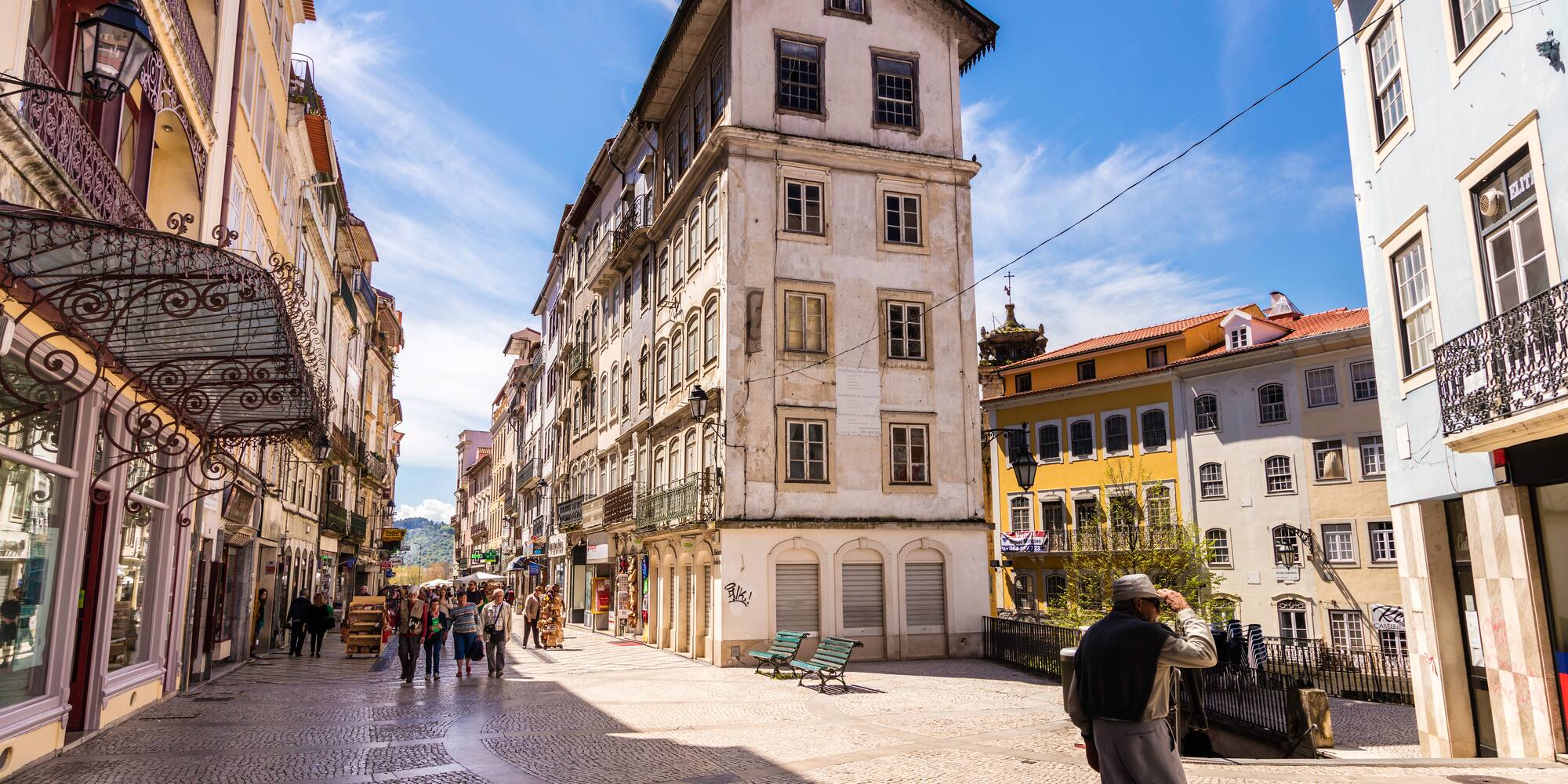 a group of people walking in a street