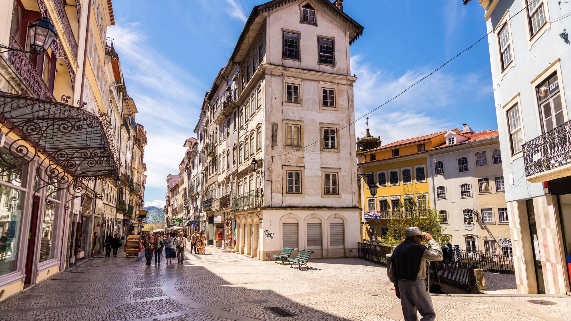a group of people walking in a street