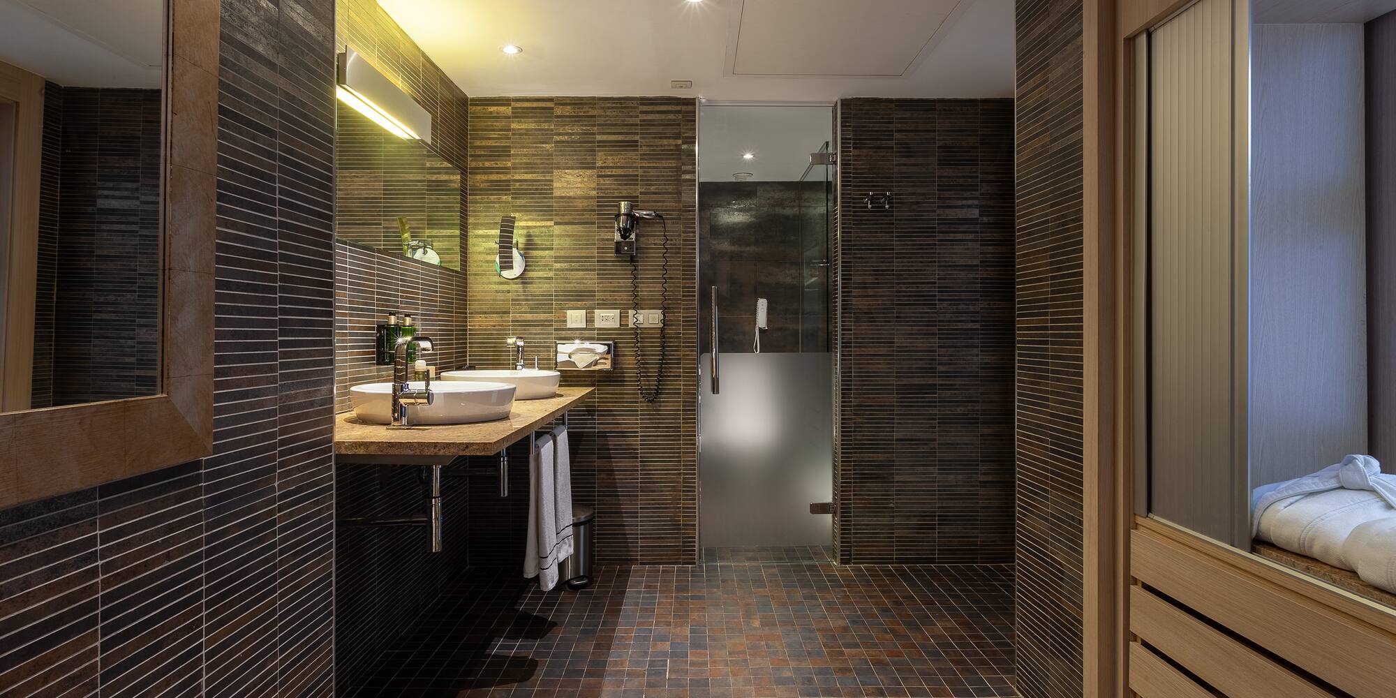 a bathroom with a sink and shower