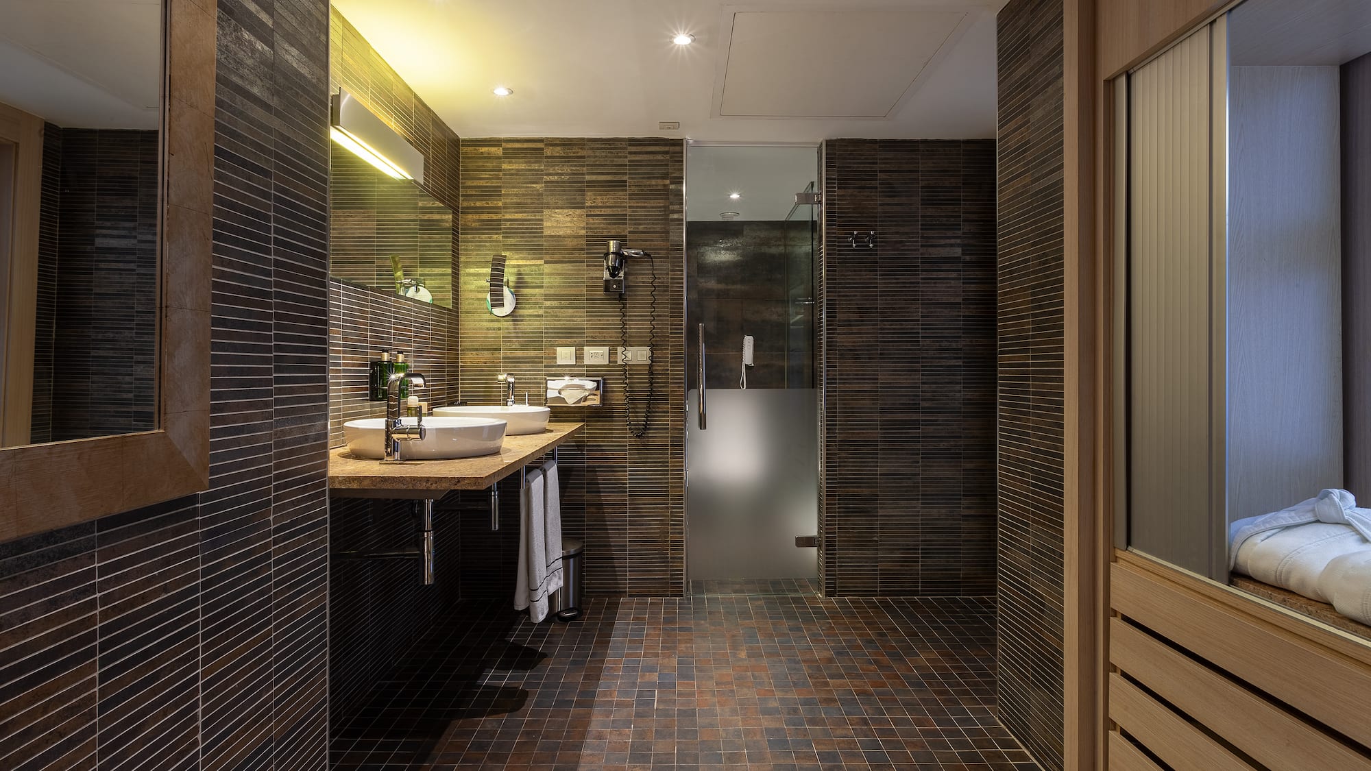 a bathroom with a sink and shower