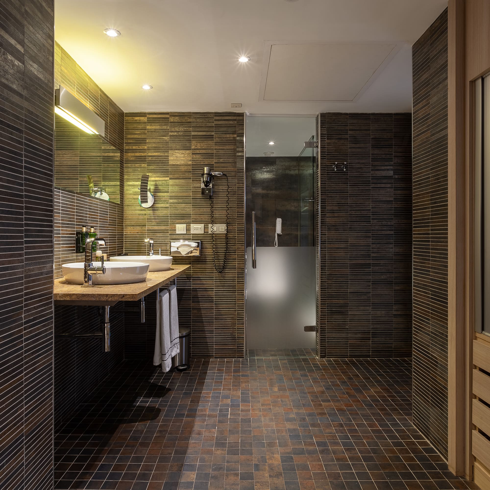 a bathroom with a sink and shower