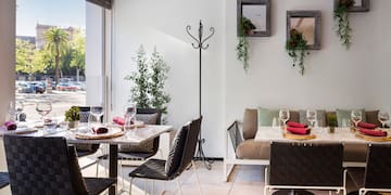 a room with a table and chairs