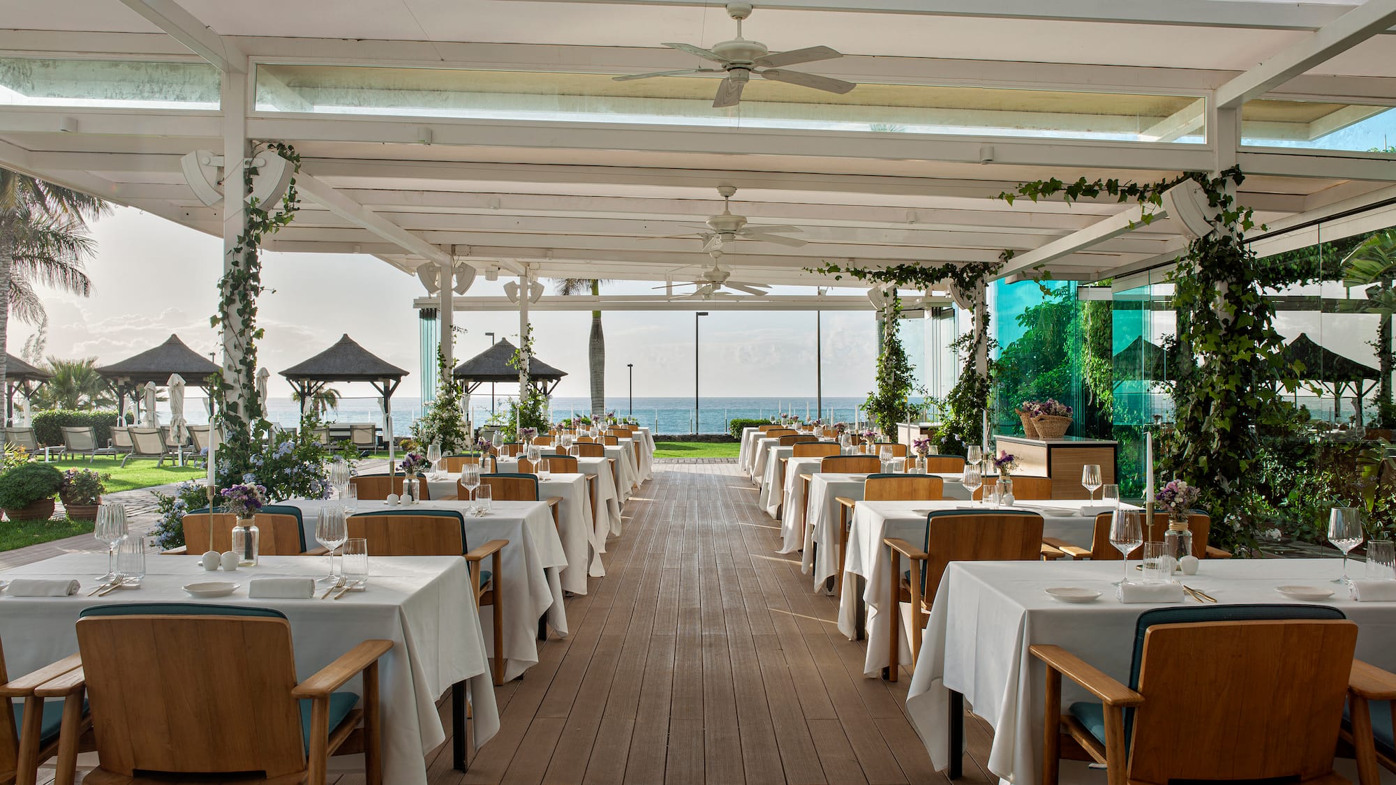 a restaurant with tables and chairs