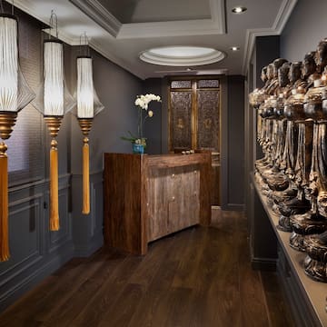 a room with a row of statues