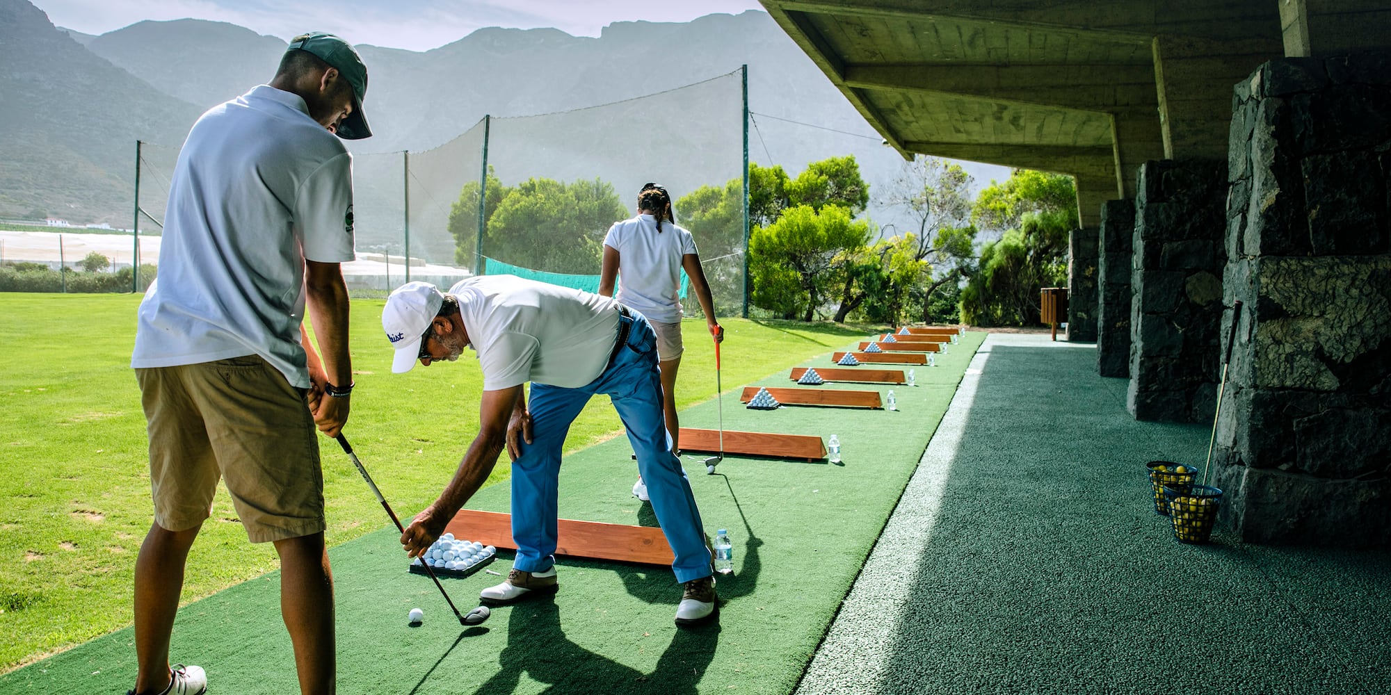 a group of people playing golf