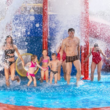 a group of people in a pool