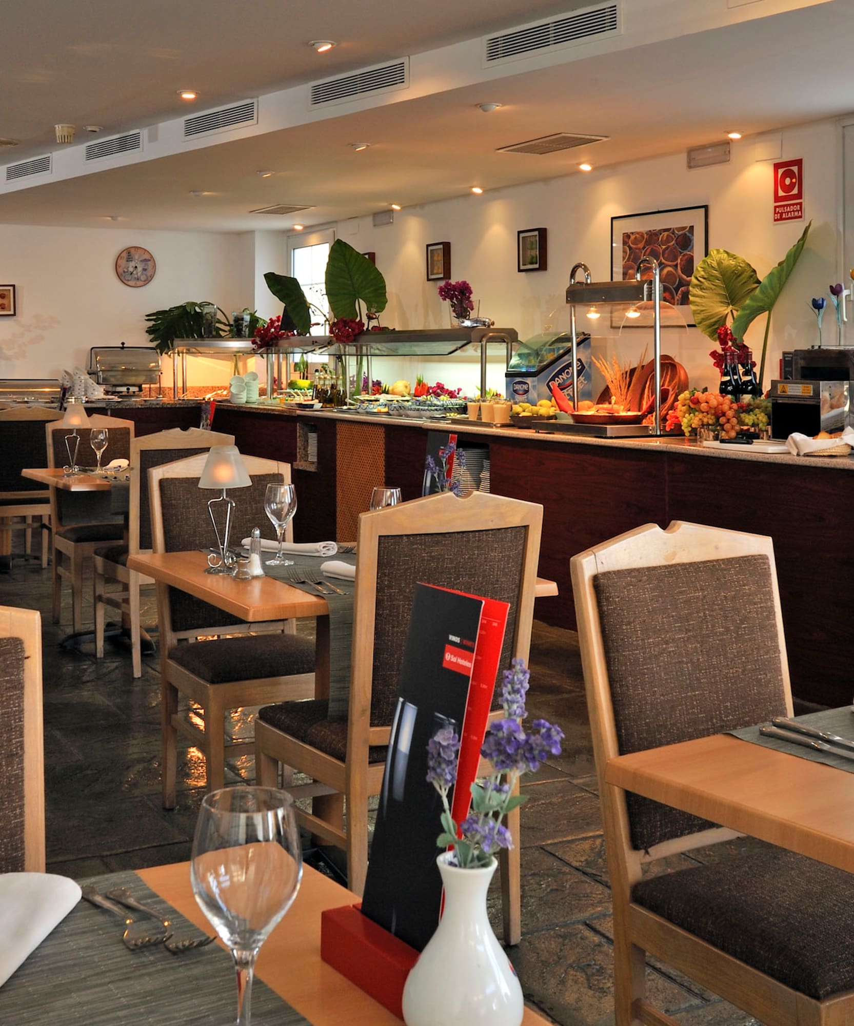 a restaurant with tables and chairs