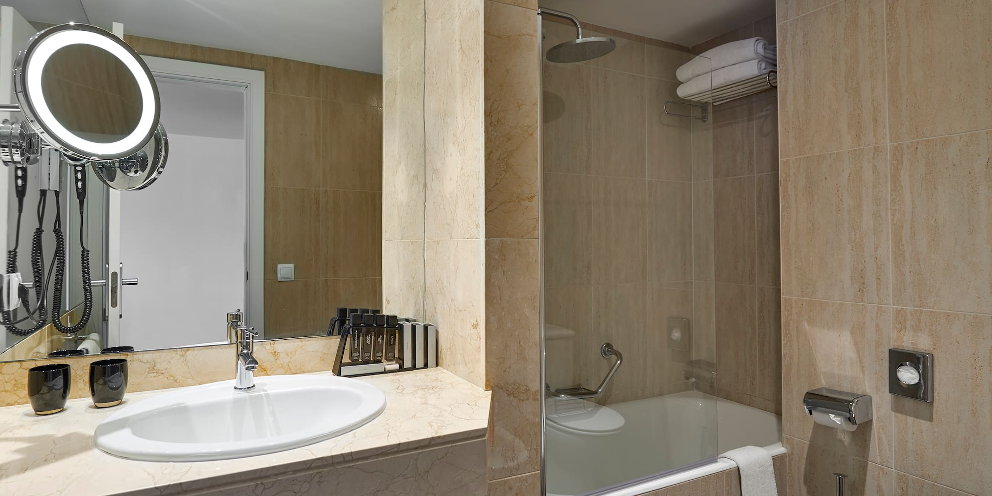 a bathroom with a sink and a shower