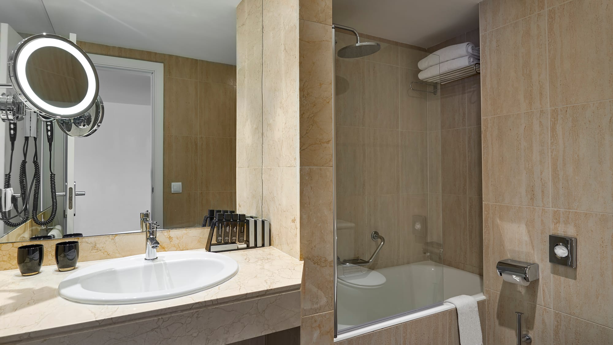 a bathroom with a sink and a shower