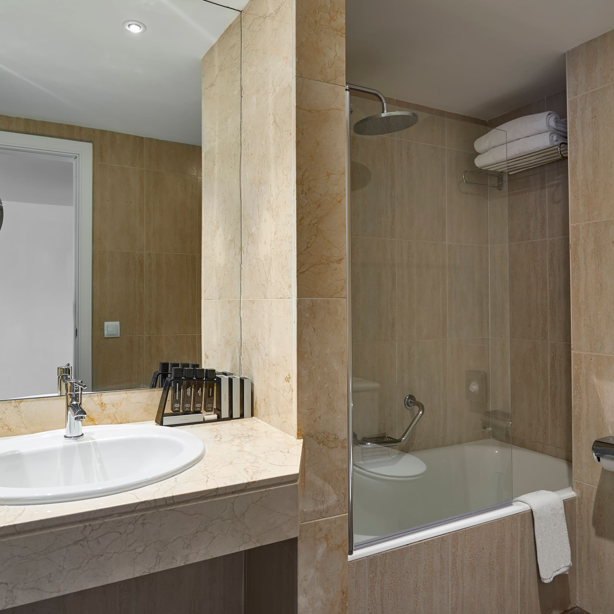 a bathroom with a sink and a shower