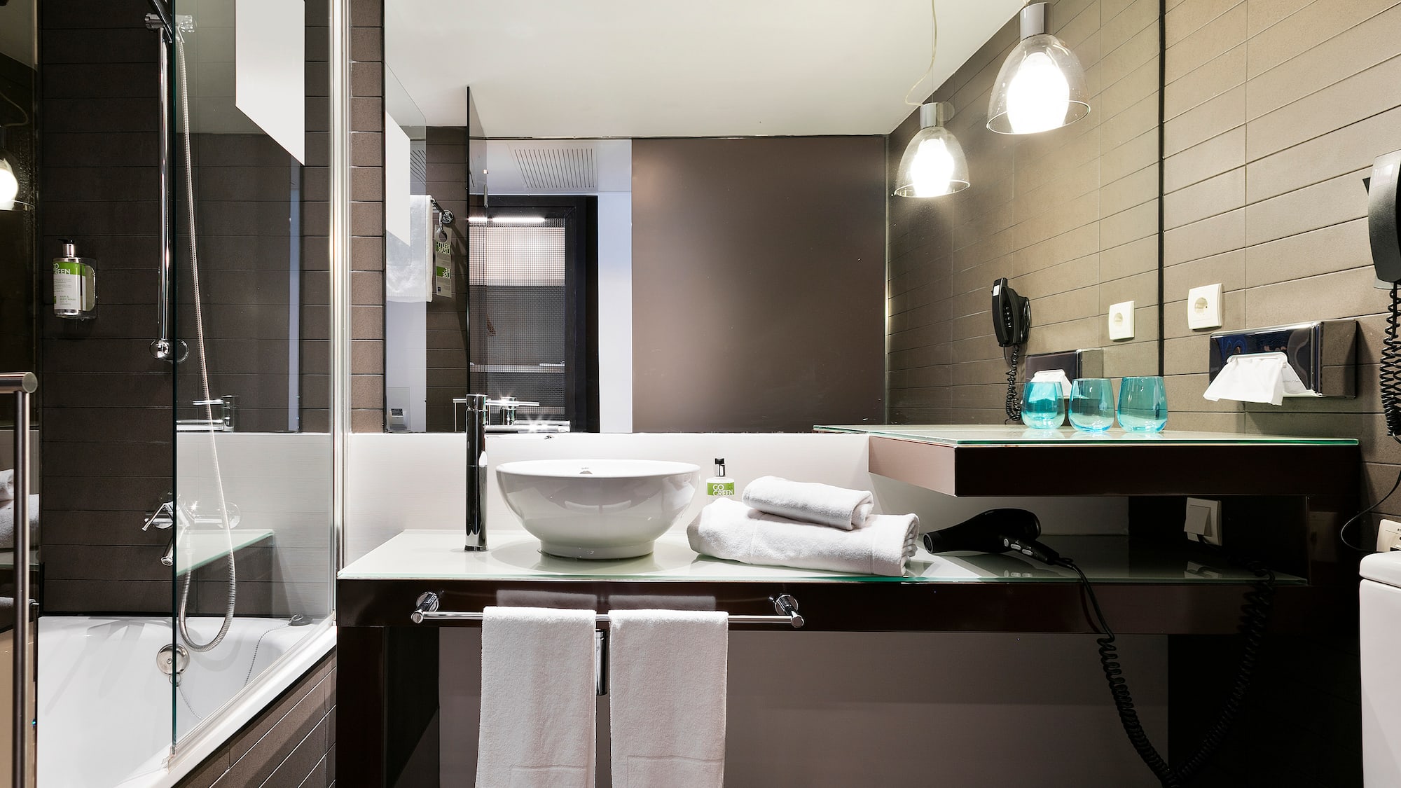 a bathroom with a sink and a shower