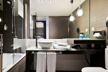 a bathroom with a sink and a shower