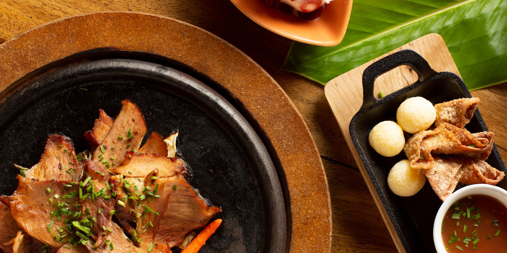 food on a plate next to a plate of food