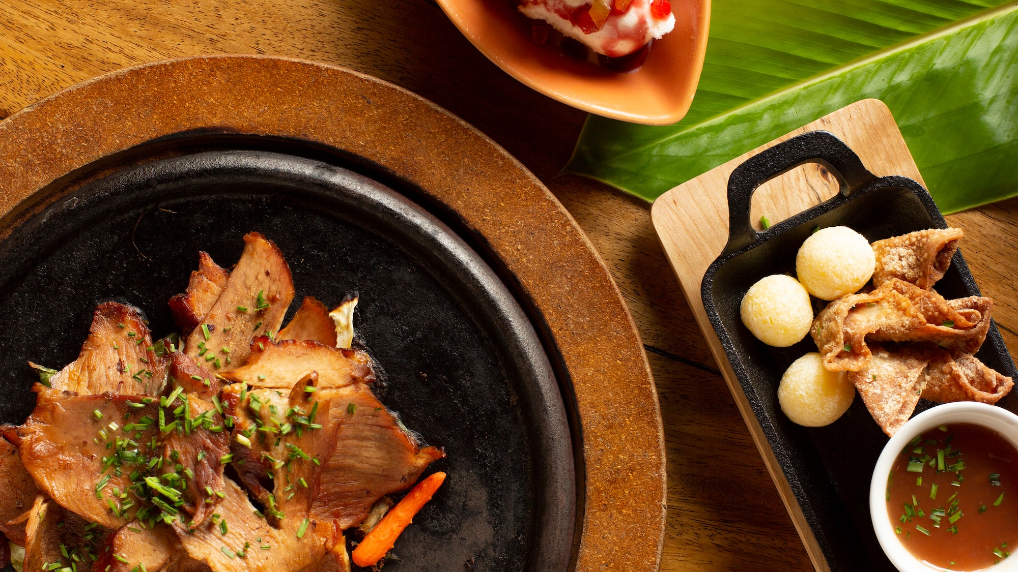 food on a plate next to a plate of food