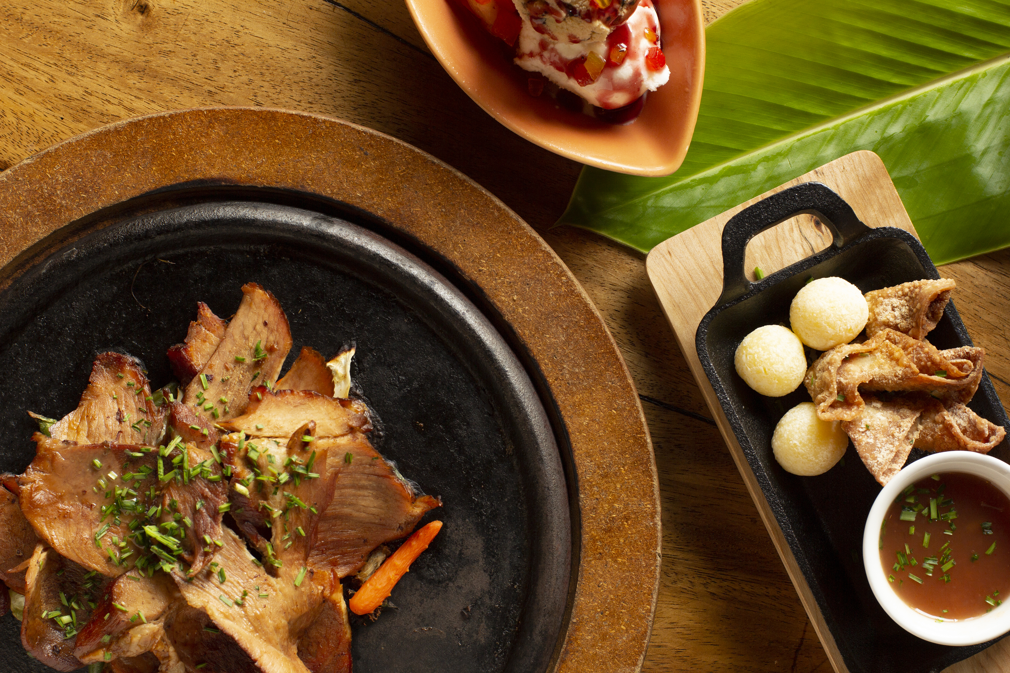 food on a plate next to a plate of food