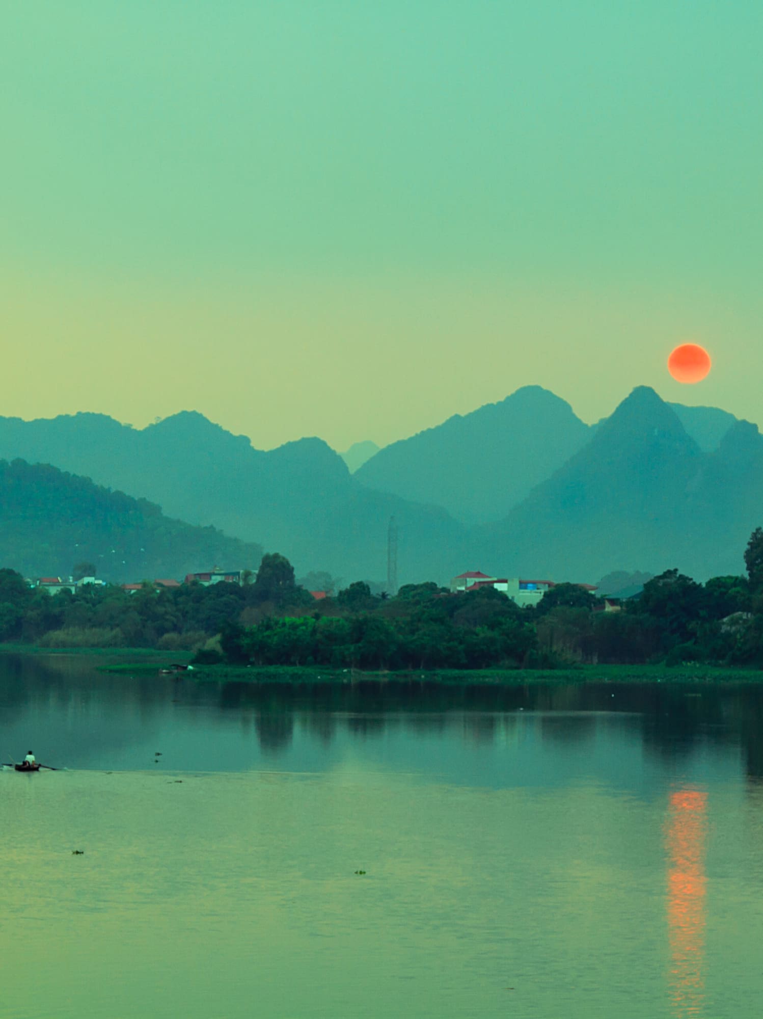 a body of water with a body of water and a boat in it