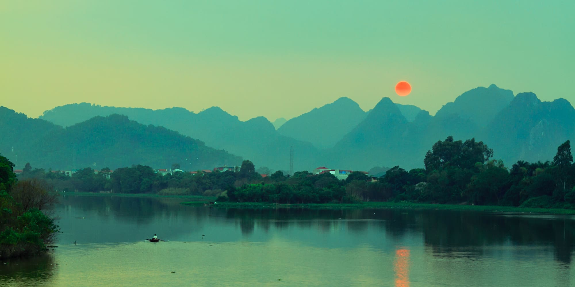 a body of water with a body of water and a boat in it