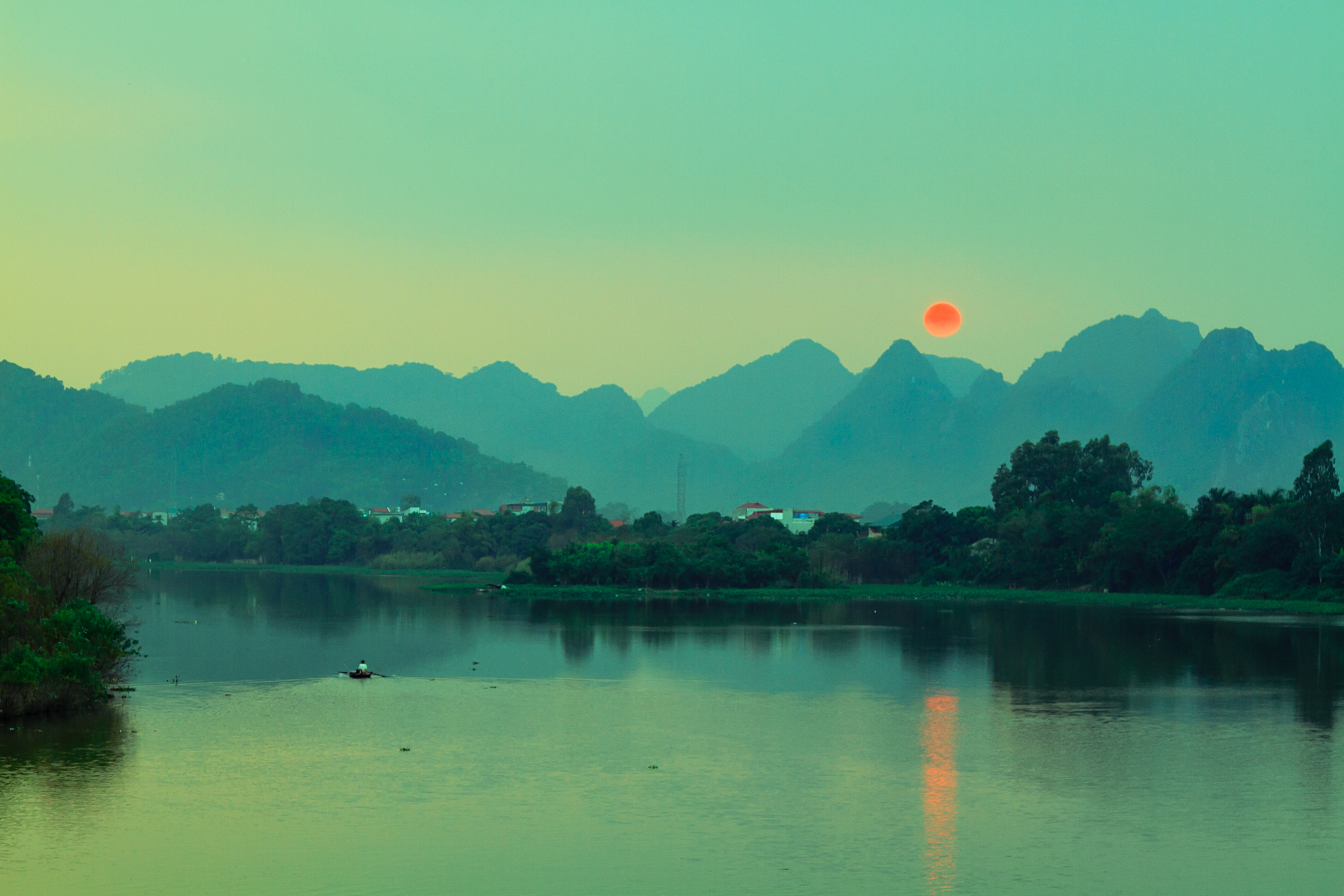 a body of water with a body of water and a boat in it